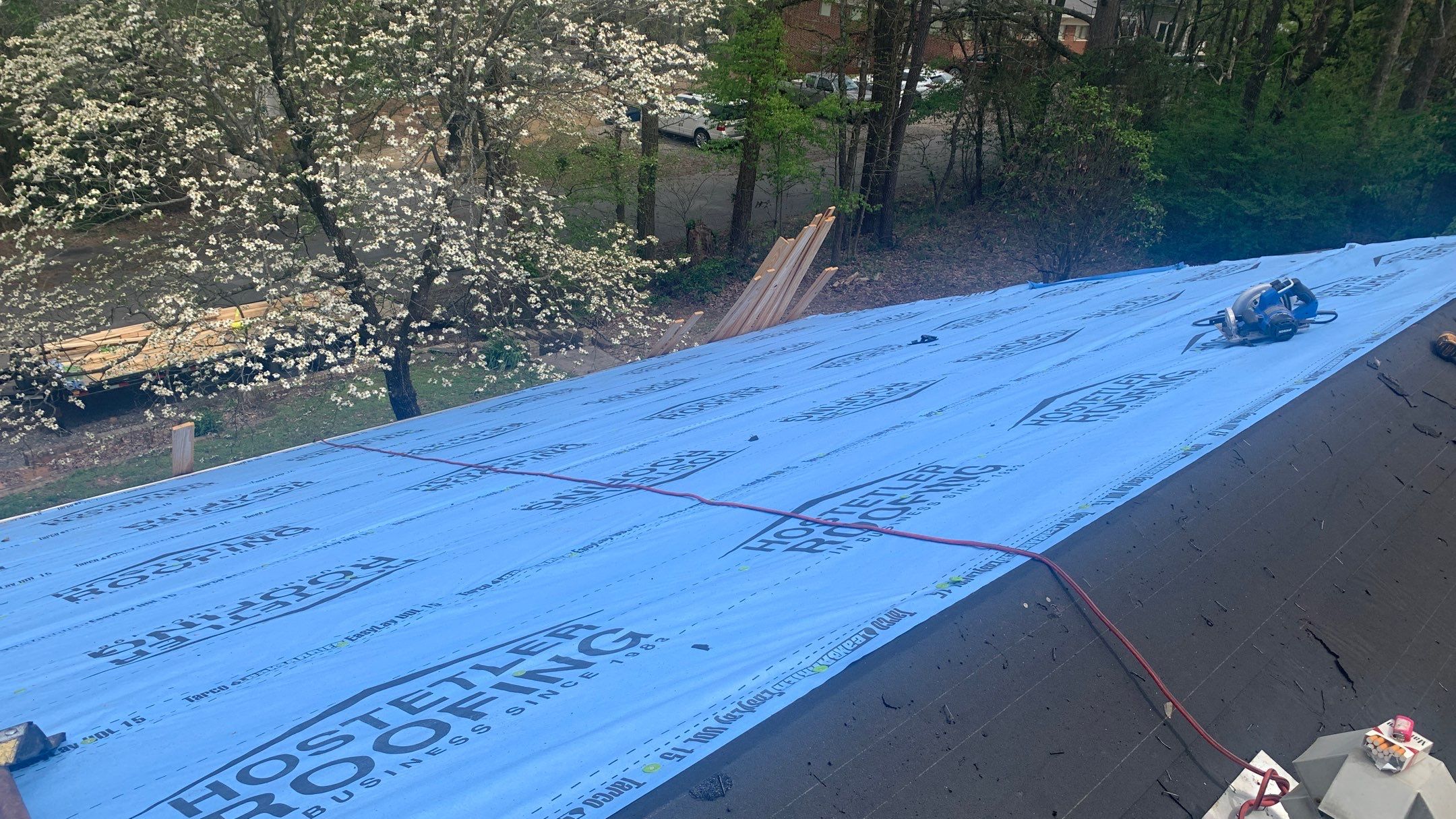 Residential Roofing Installation using 26 Gauge Colored Panels by Hostetler Roofing
