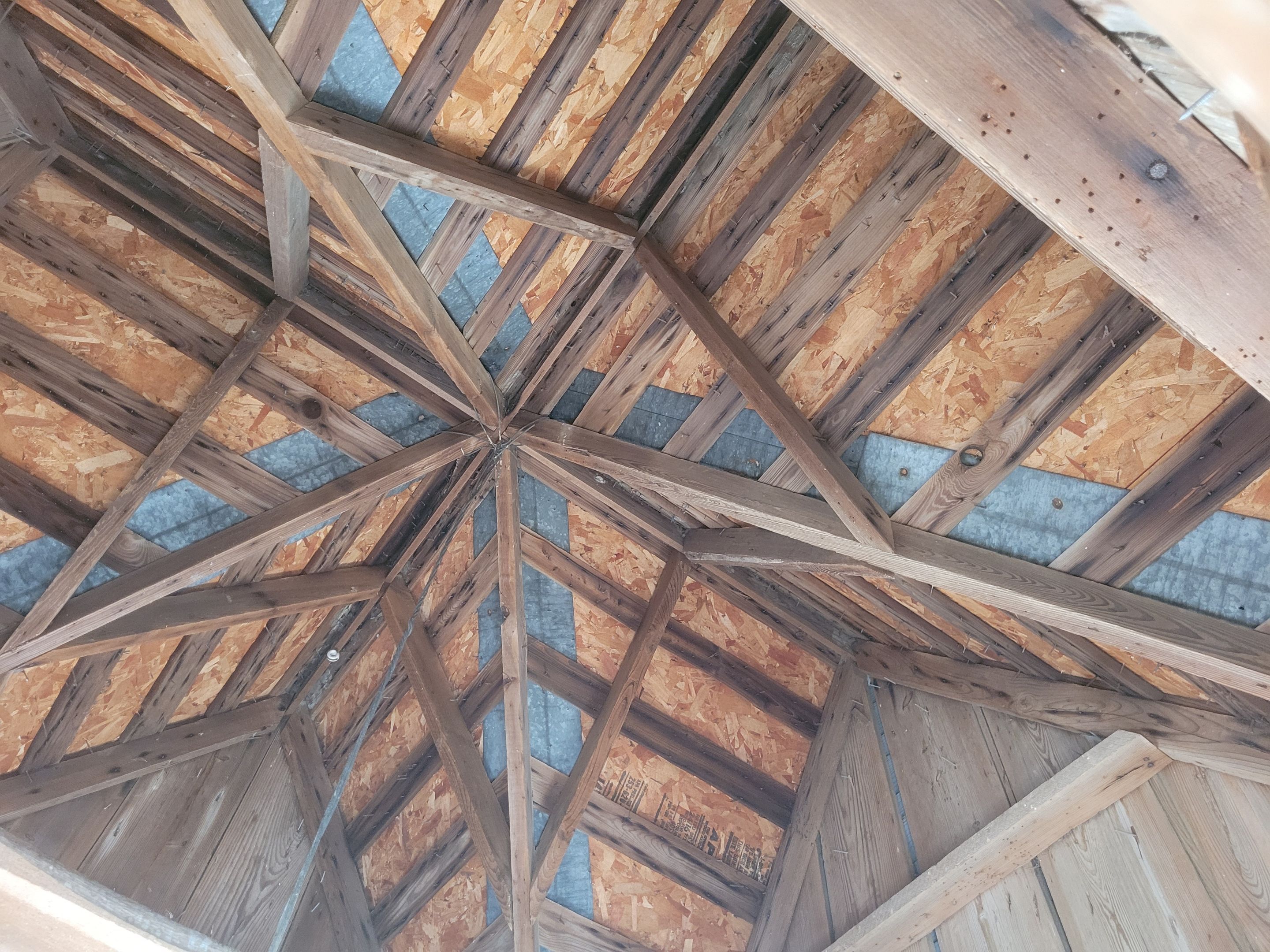 New metal roof on heirloom barn by Dagny Builders