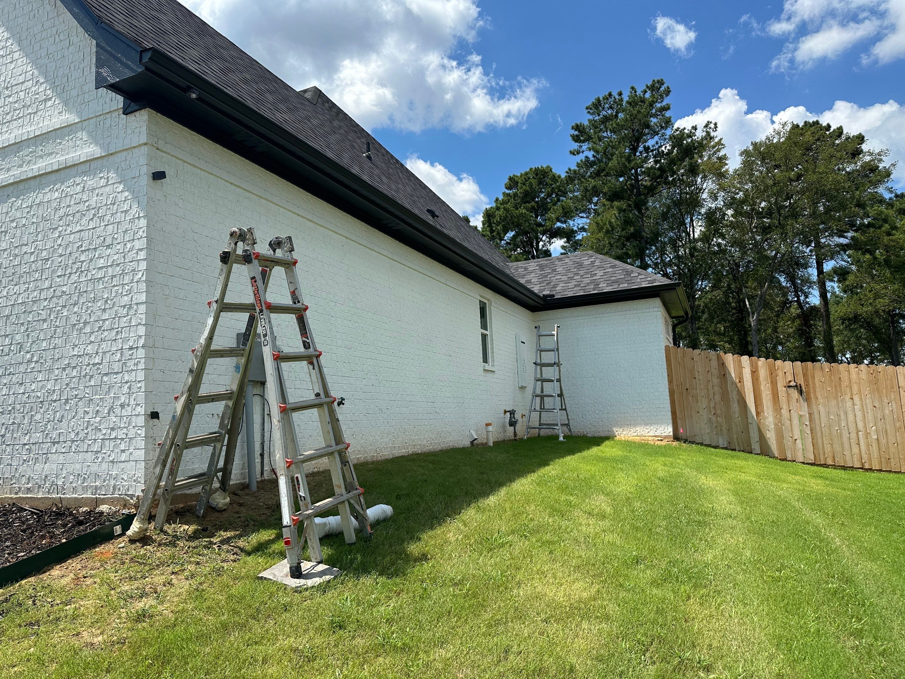 Exterior Painting in Longview, TX | Roof & Eaves in Elegant Black by Quality Coats Painting