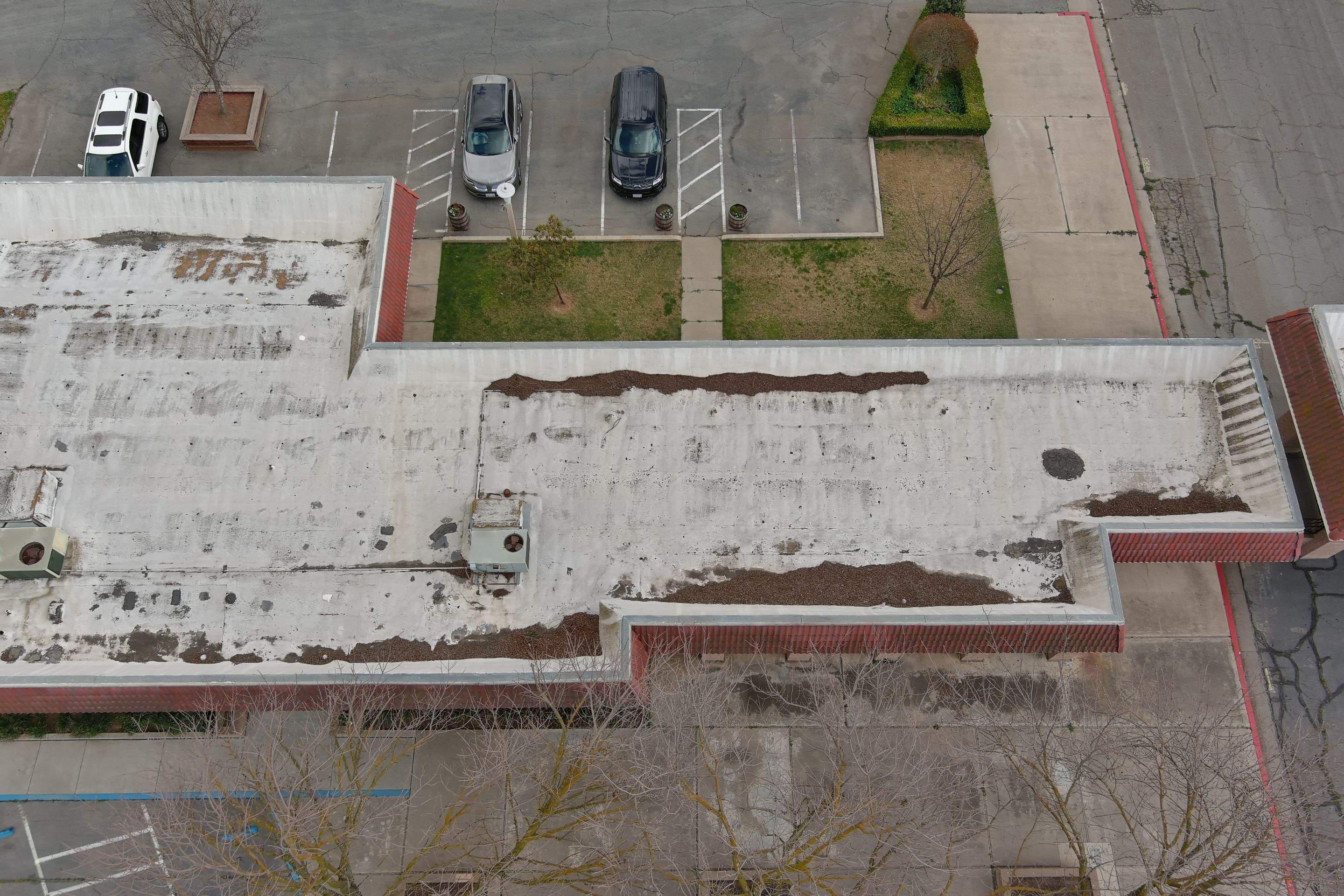 Commercial Roofing Installation using General Coatings acrylic coatings and spray foam by Straight Edge Roofing Inc