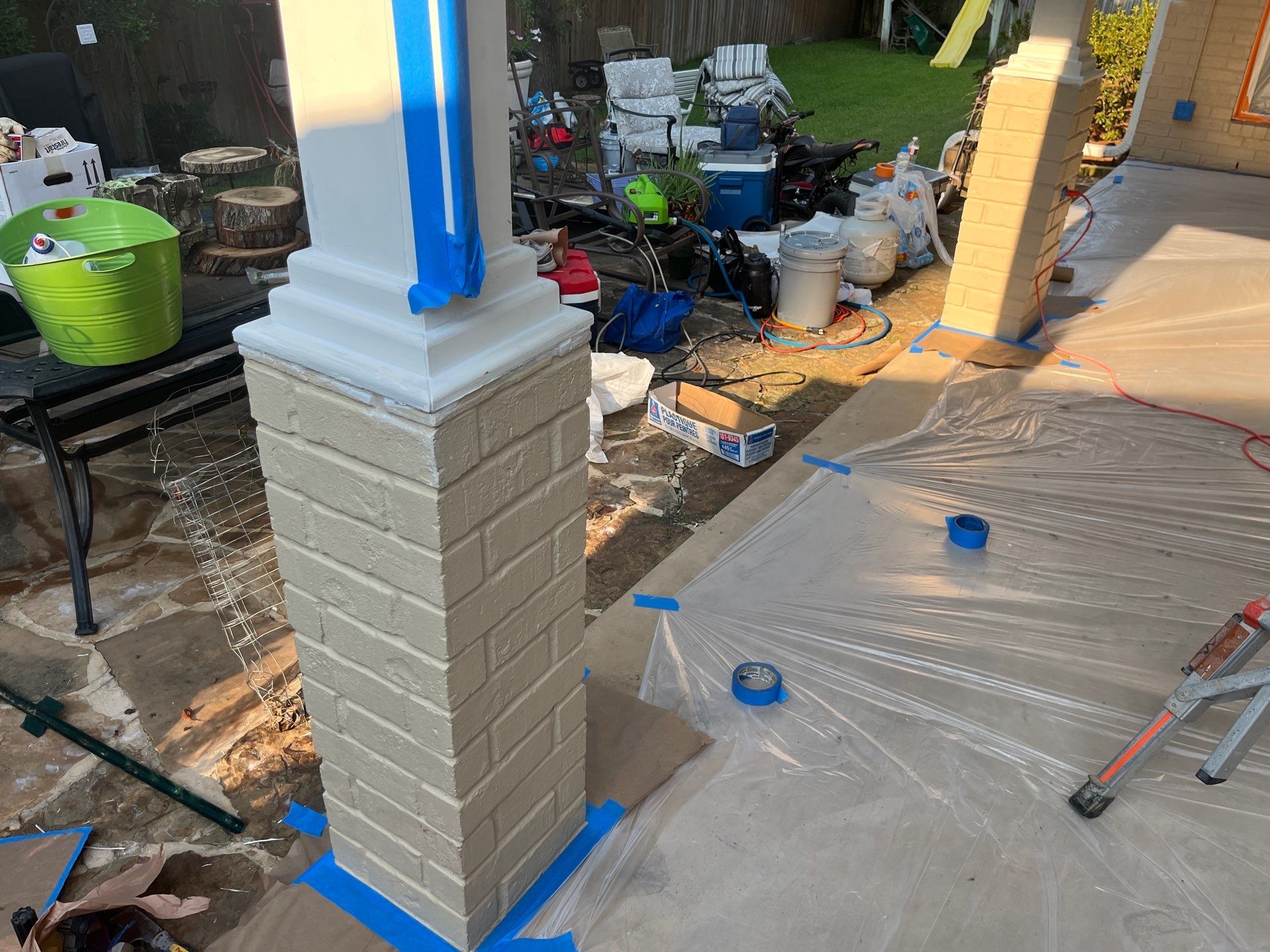 Exterior Painting in Tyler, TX | Brick House with White & Blue Finish by Quality Coats Painting