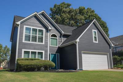 Lawrenceville, GA Full Siding Replacement, Exterior Painting, and Window Installation