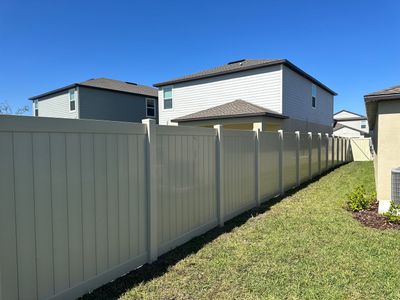Vinyl Fence Installation using 6ft Tan Vinyl Privacy Fence
