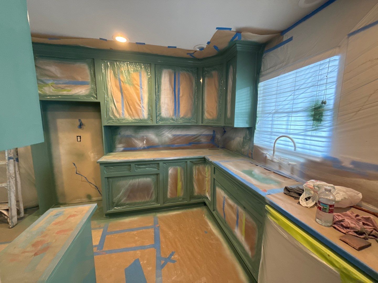 Elegant Transformation: Stained Cabinets Revamped with Sherwin-Williams Juniper by Cougar Painting