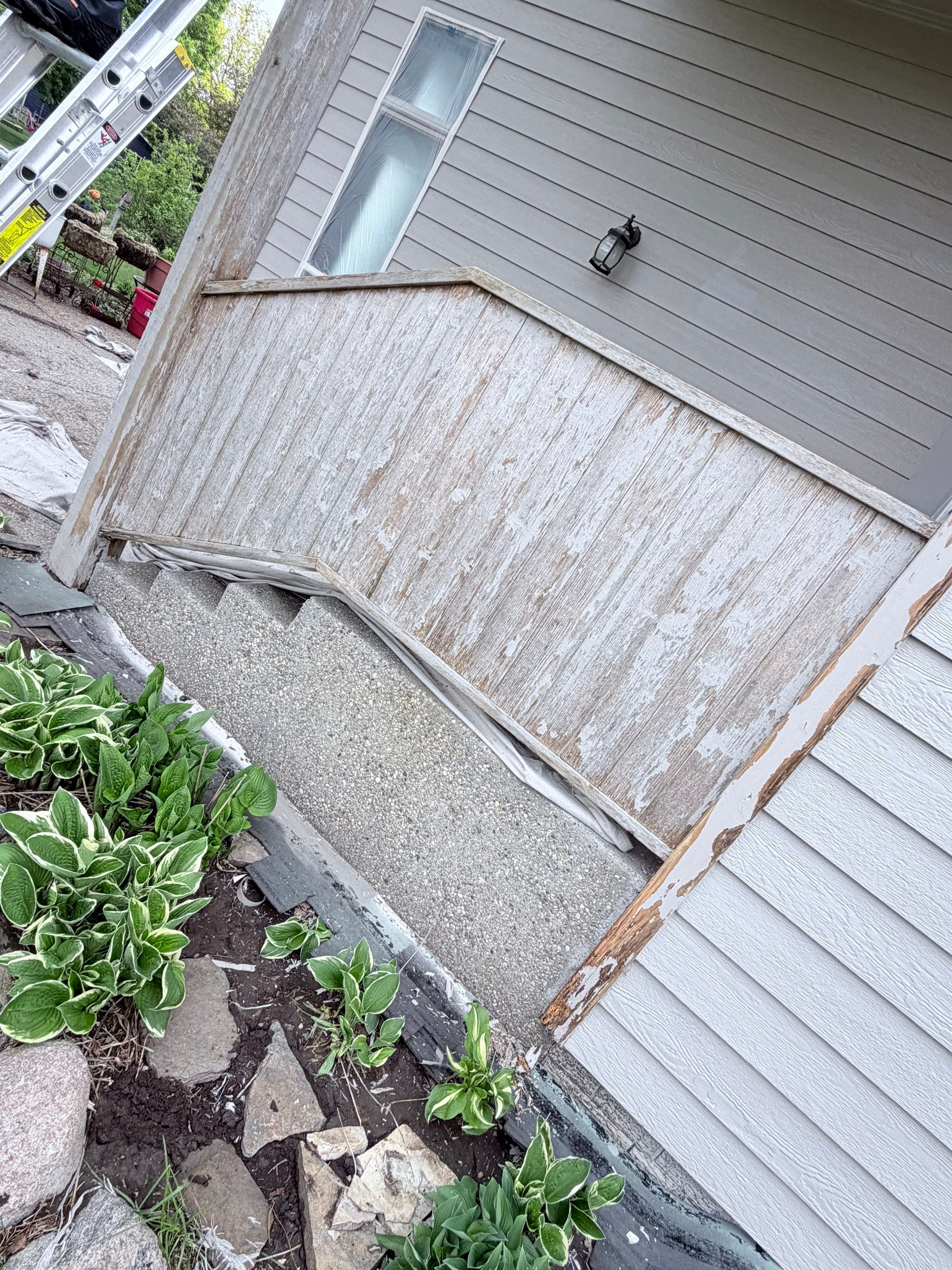Exterior Siding and Trim Painting for Sioux Falls Residence by Select Painting, Coatings & Garage Cabinets