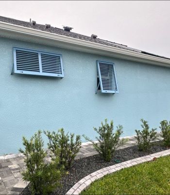 Hurricane Rated Shutters in Pastel Blue