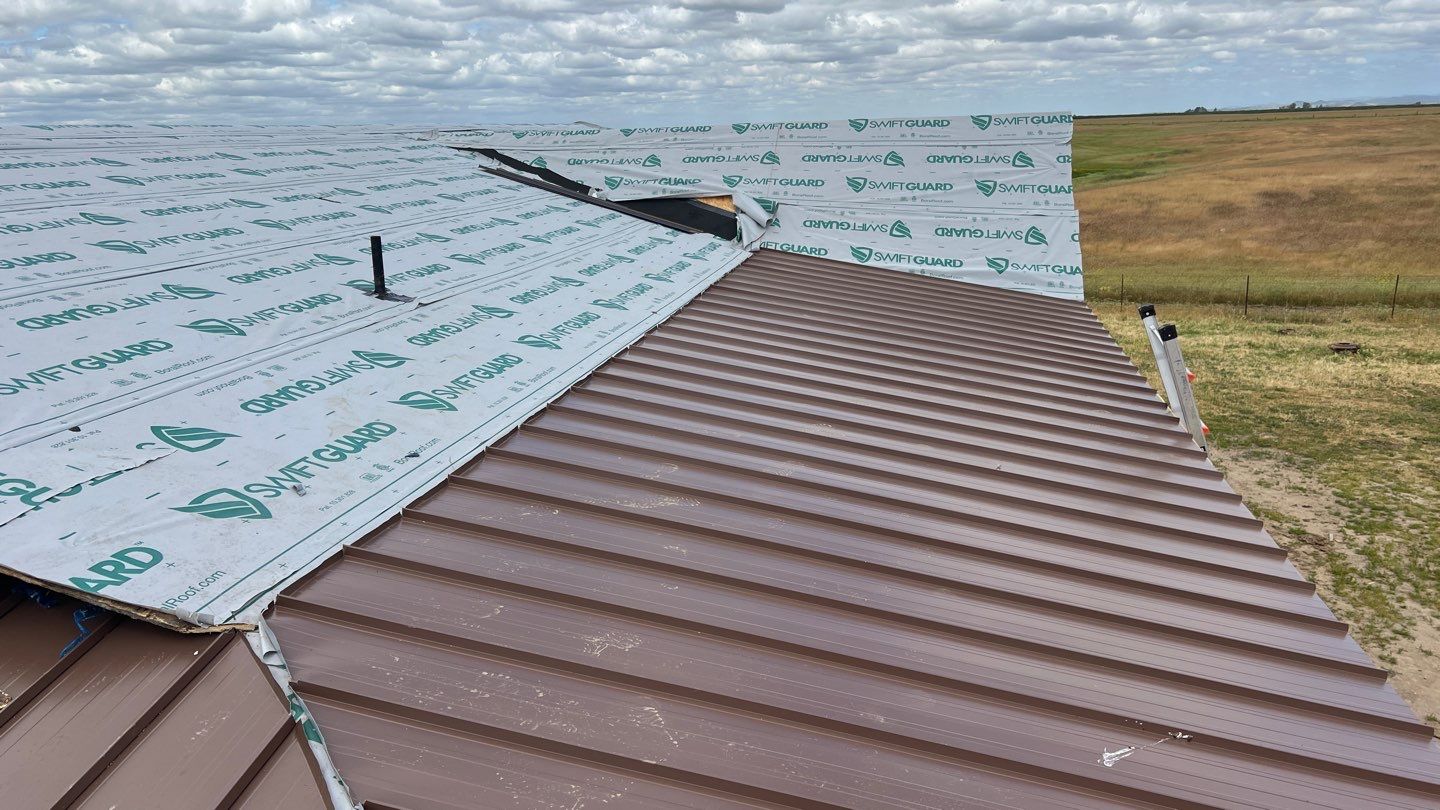 Metal roofing installation using Standing seam metal roofing system by Straight Edge Roofing Inc