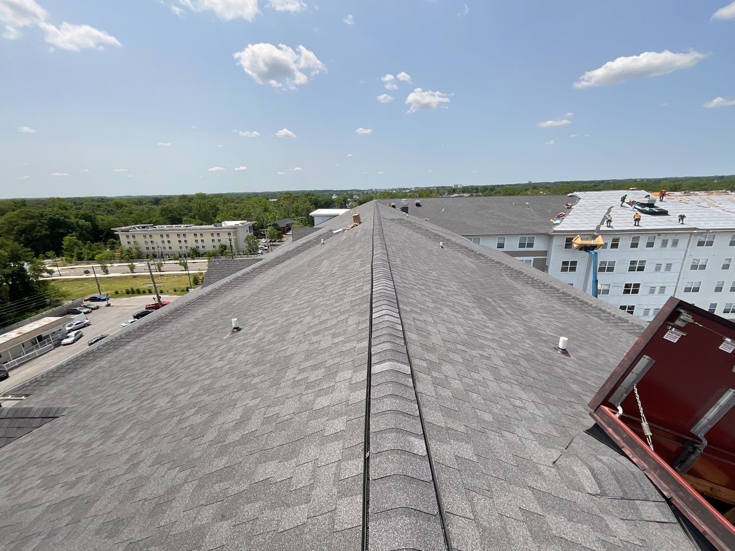 Multi-Family Commercial shingle roof by Alpha Design Services
