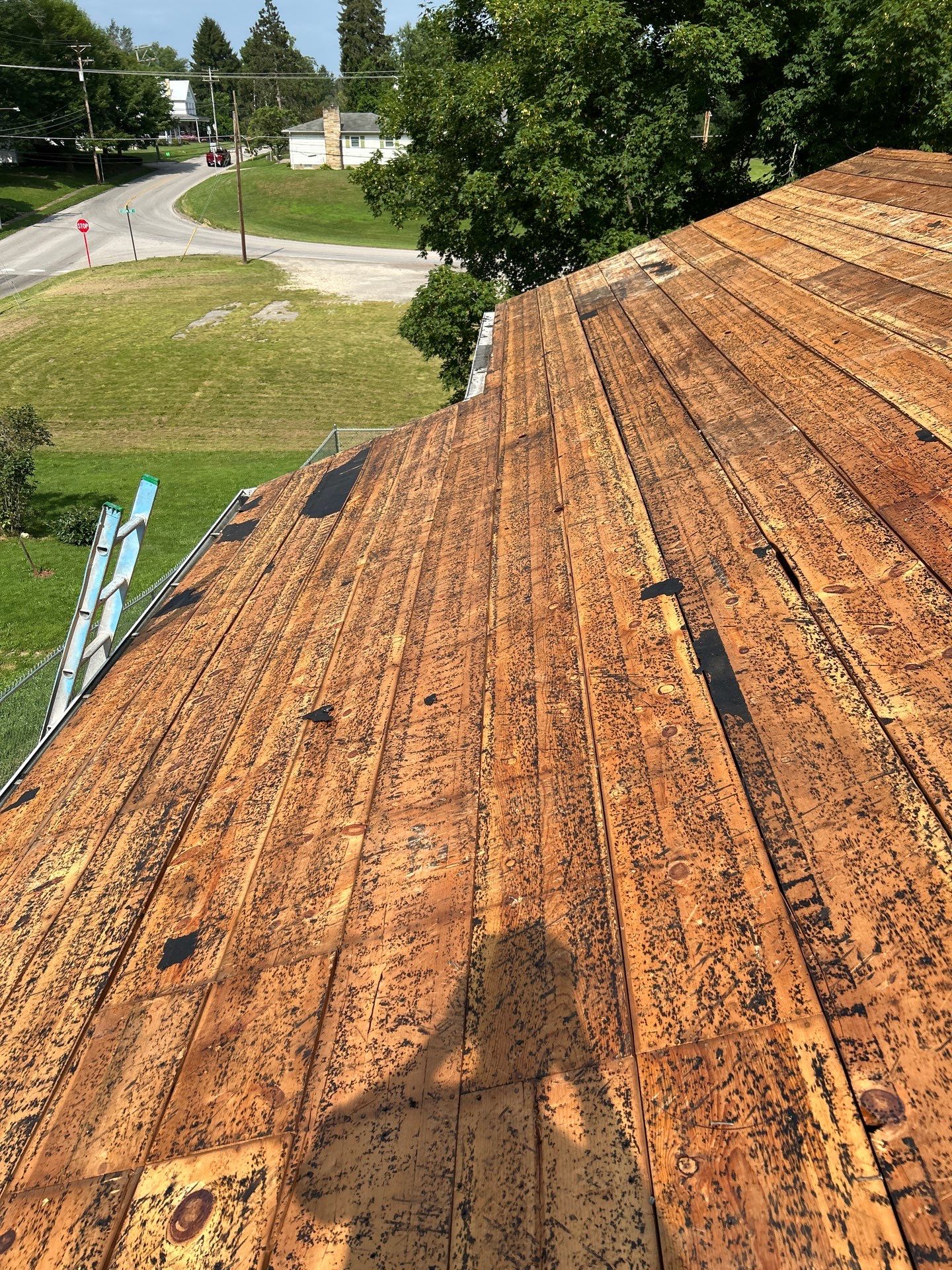 Residential Roofing Installation using GAF Timberline HDZ Oyster Grey by Rainstoppers Roofing