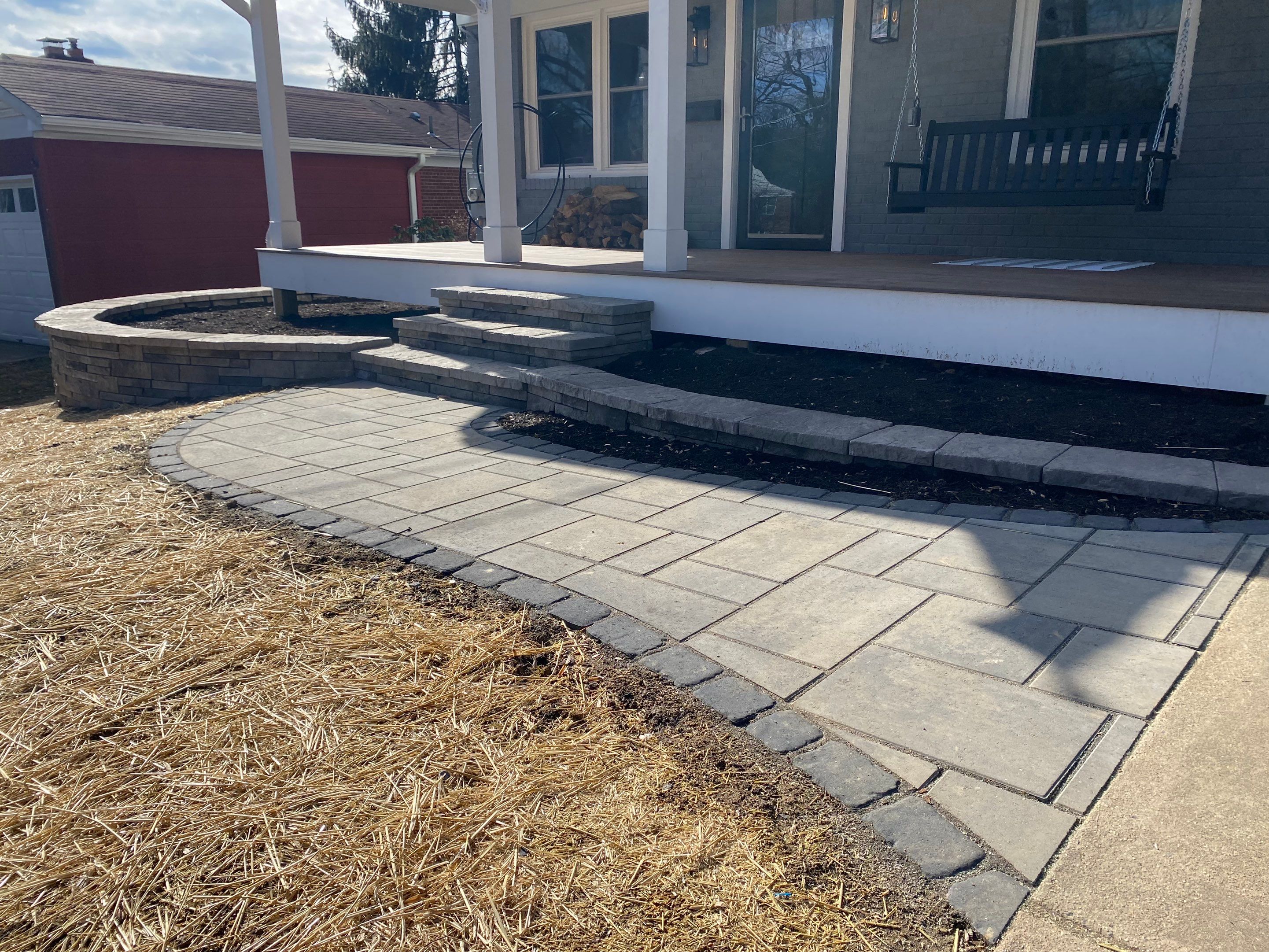 Retaining wall, walkway, small patio and landscape install by The Smet Companies, LLC