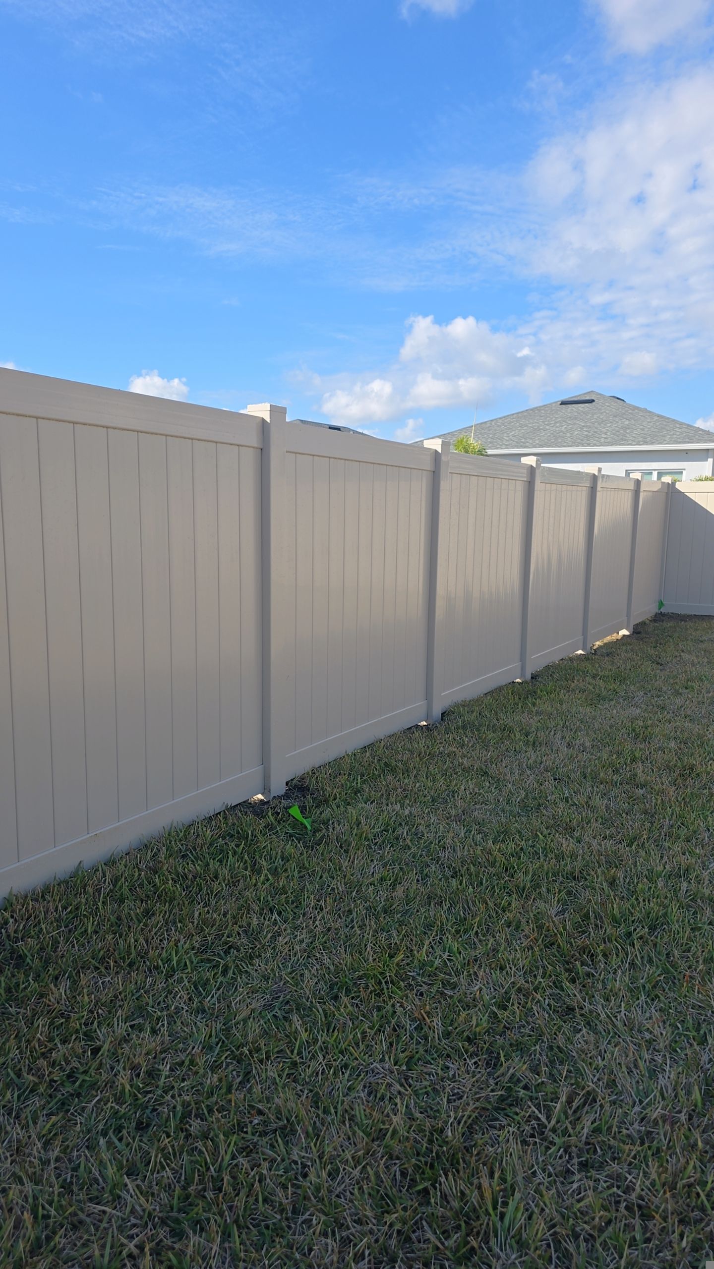 Tan Vinyl Fence in West Port by True Fence LLC
