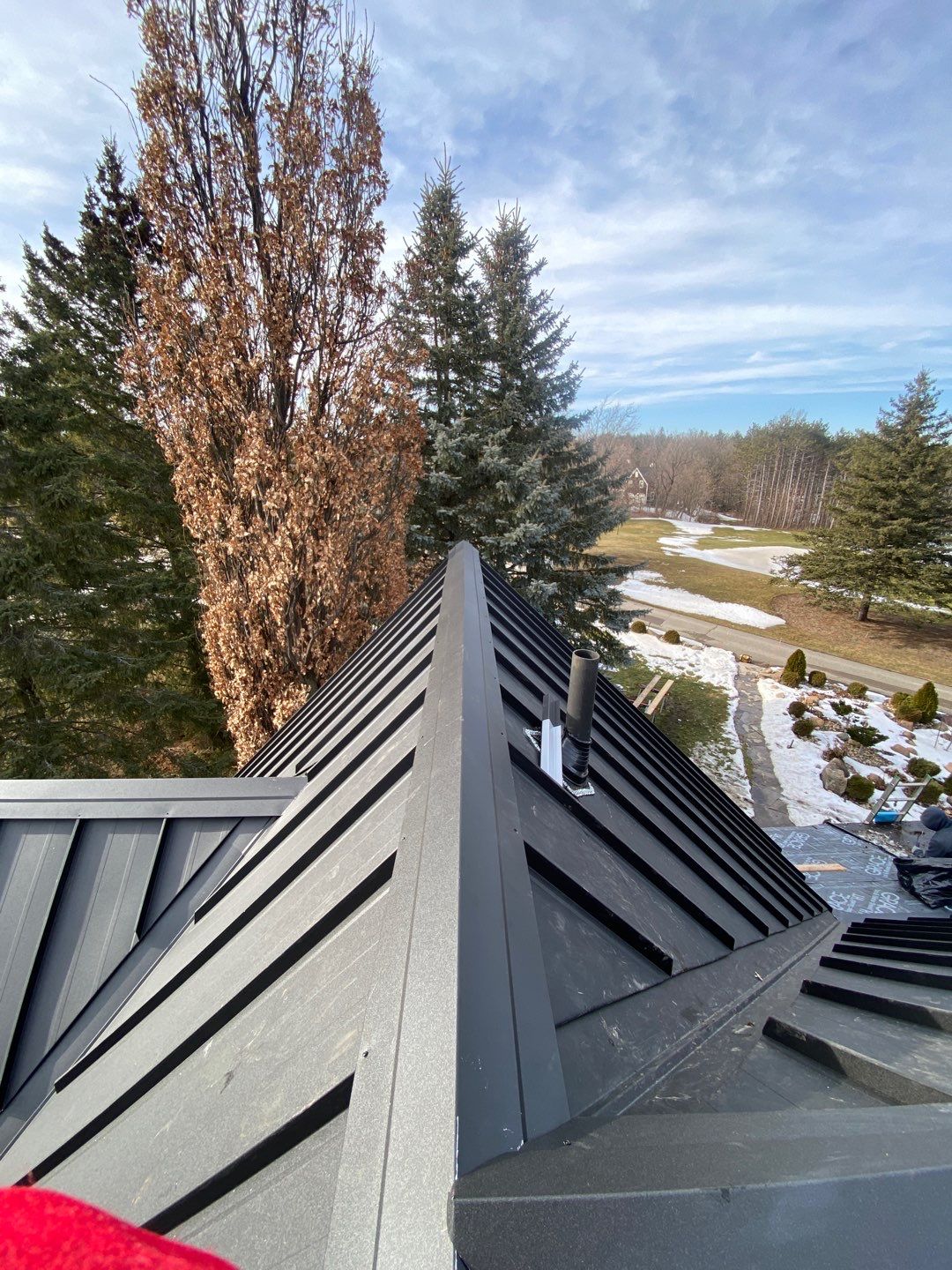 Residential Roofing Installation using 24 Ga Standing Seam Metal by Jay Carter Roofing & Sheet Metal