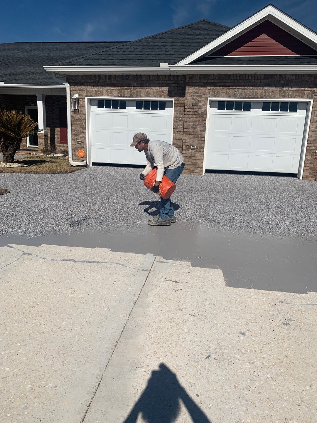 Dynamic Domato Driveway by Deese Elite Concrete Coatings