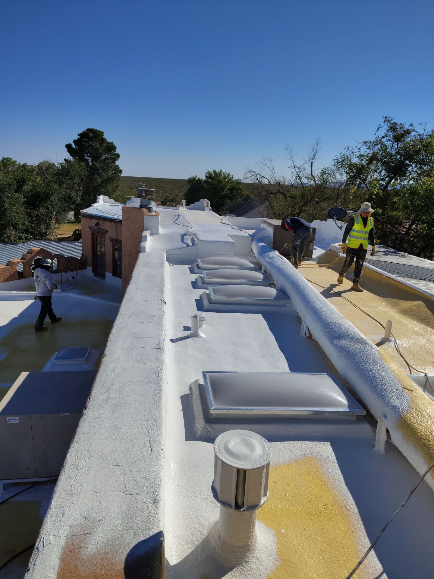 Residential roof application by SPF Services 