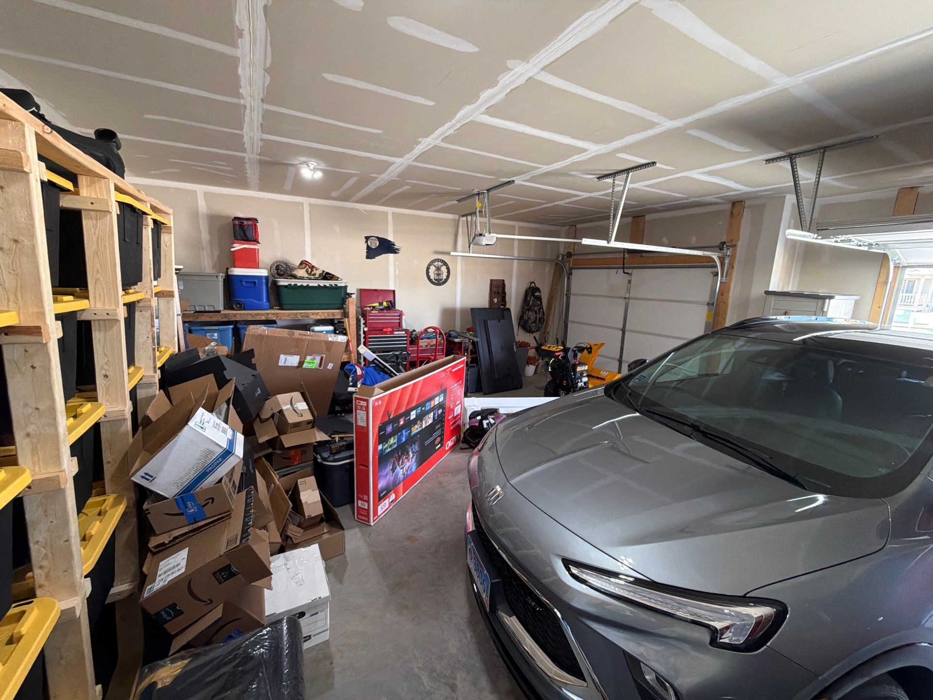 Epoxy Garage Floor Coating with Decorative Flake in Harrisburg by Select Painting, Coatings & Garage Cabinets