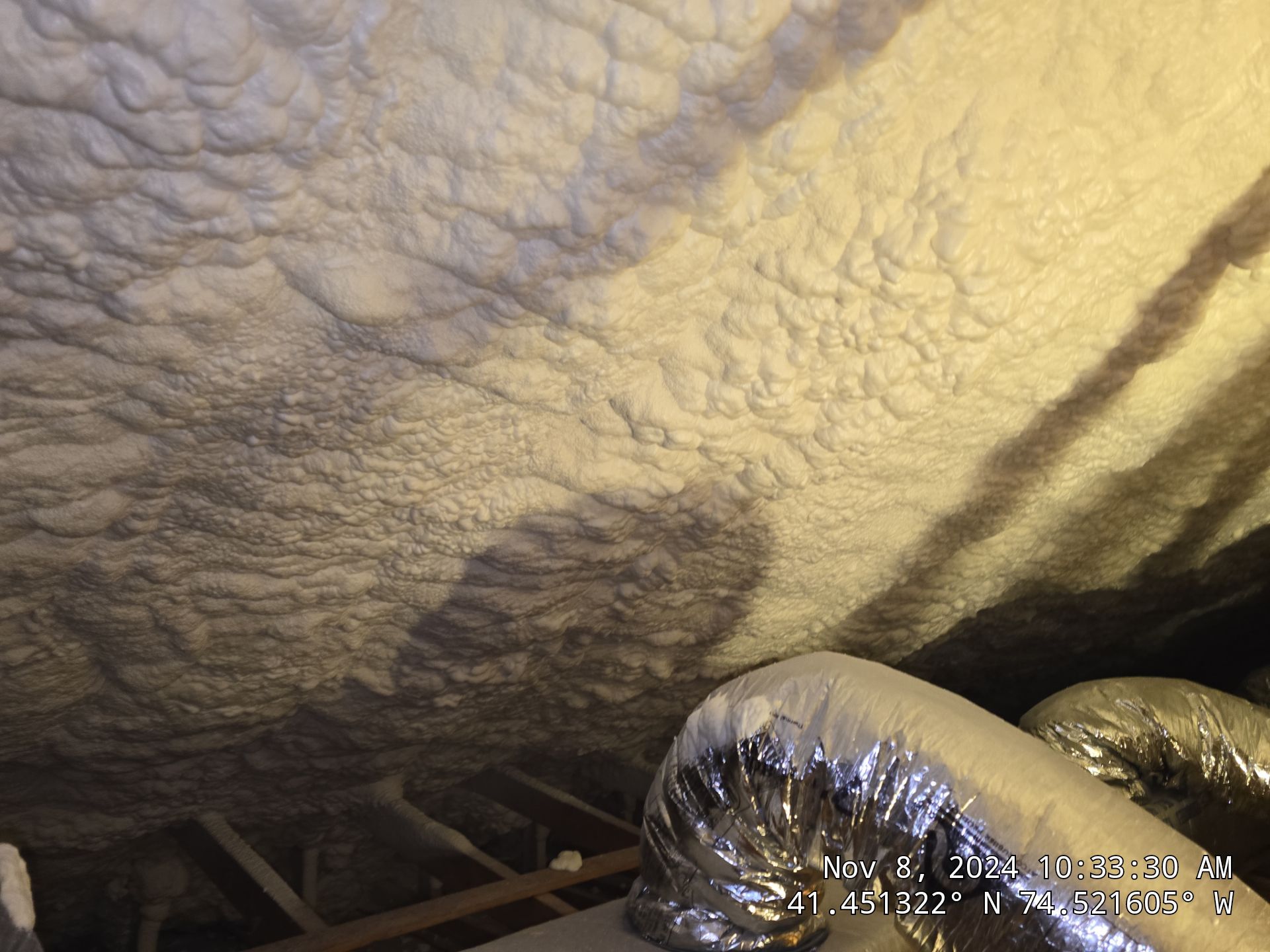 Attic Insulation using open cell spray foam by NYS Foam & Energy