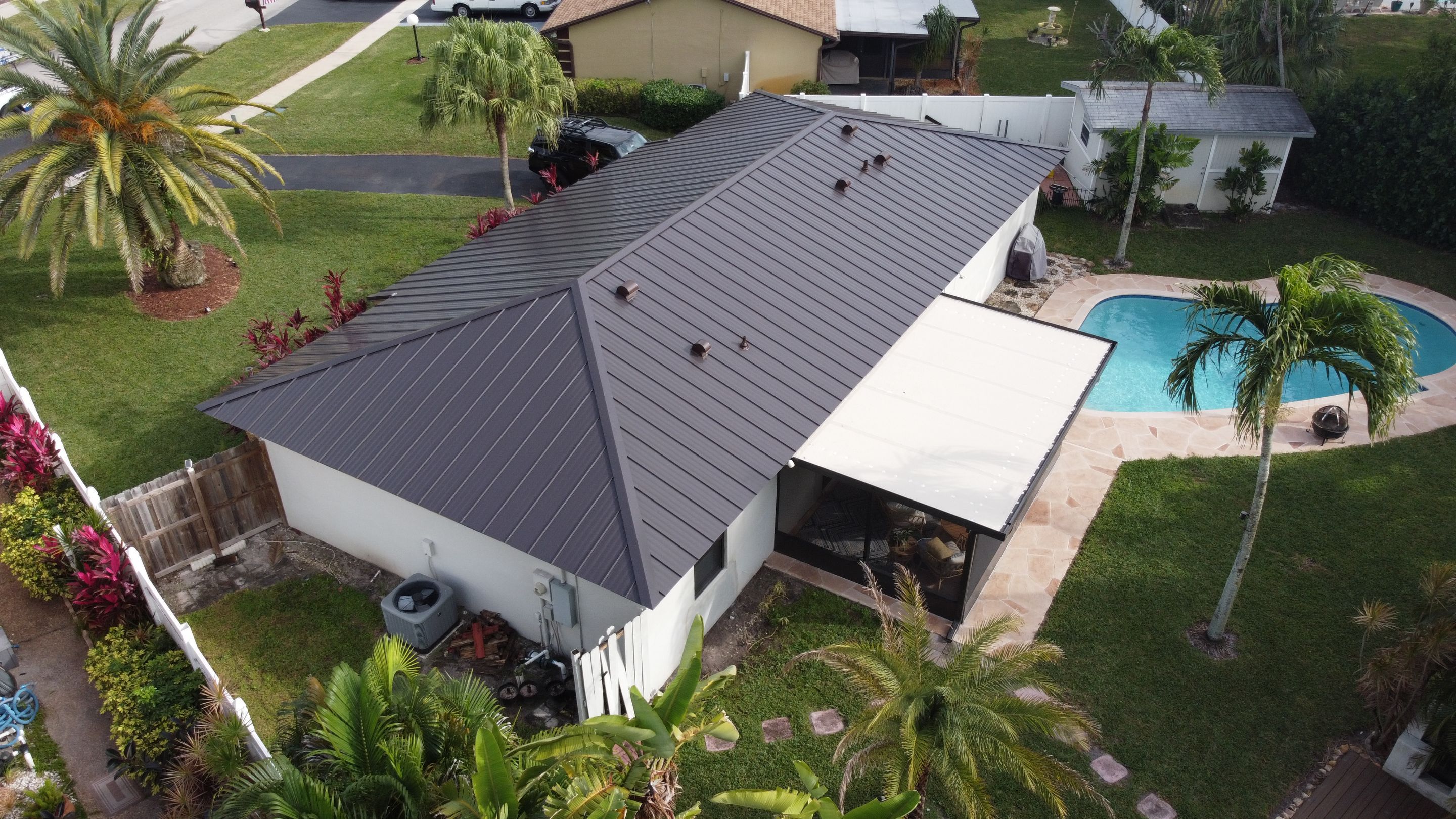 Residential Roofing Installation using 1" Nail strip metal roof by BLUES BROTHERS CONSTRUCTION CORP
