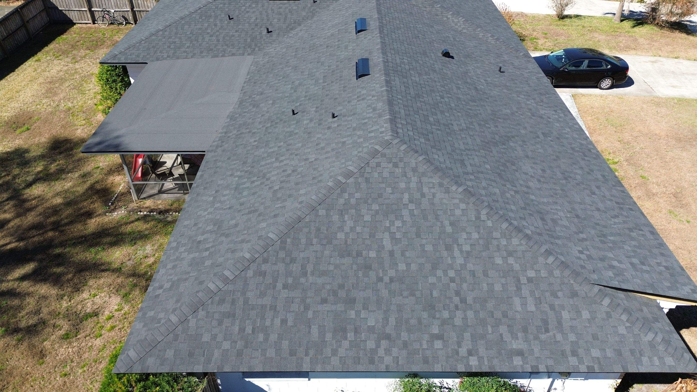 Moire black roof in Conway FL by Gold Key Roofing