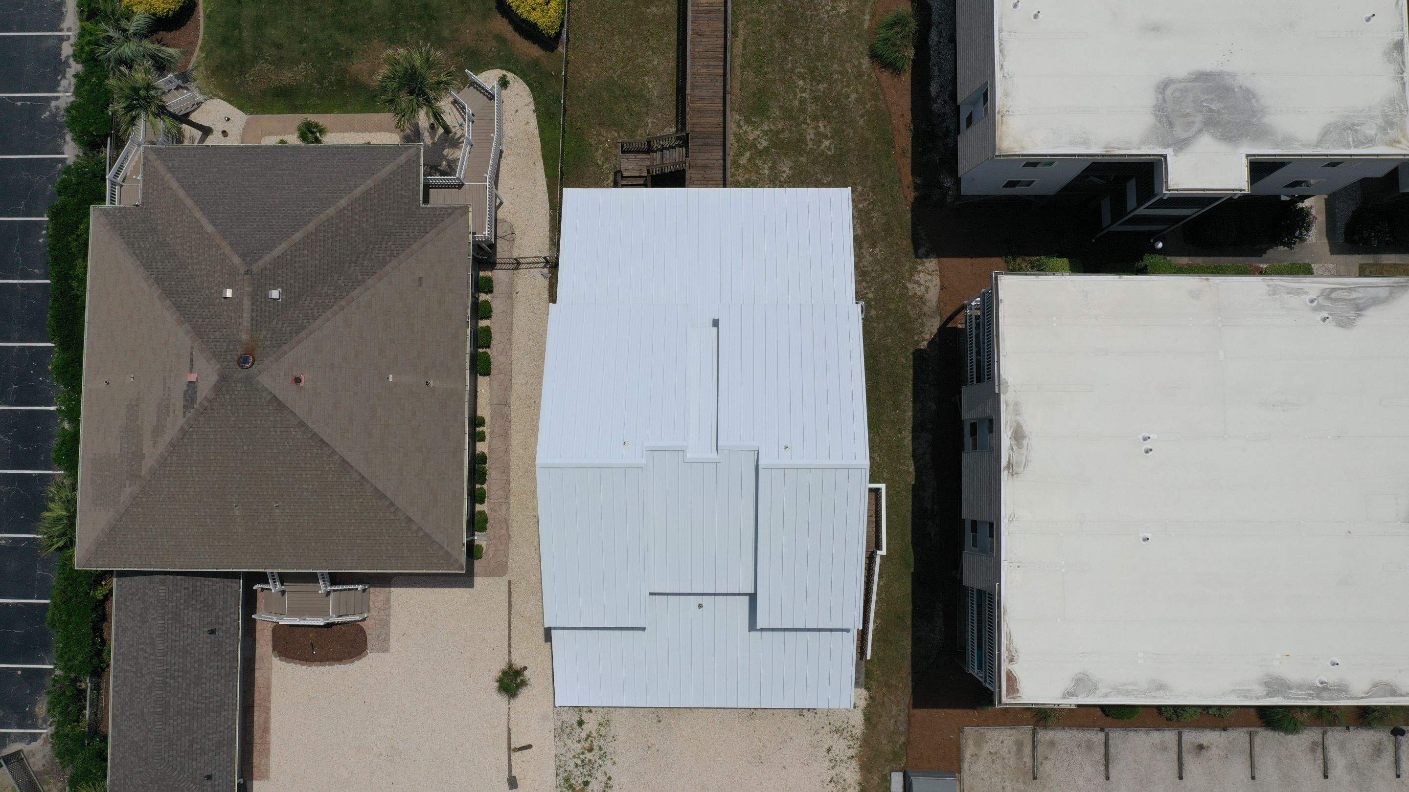 Standing Seam Aluminum- Regal White  by Linta Roofing Inc
