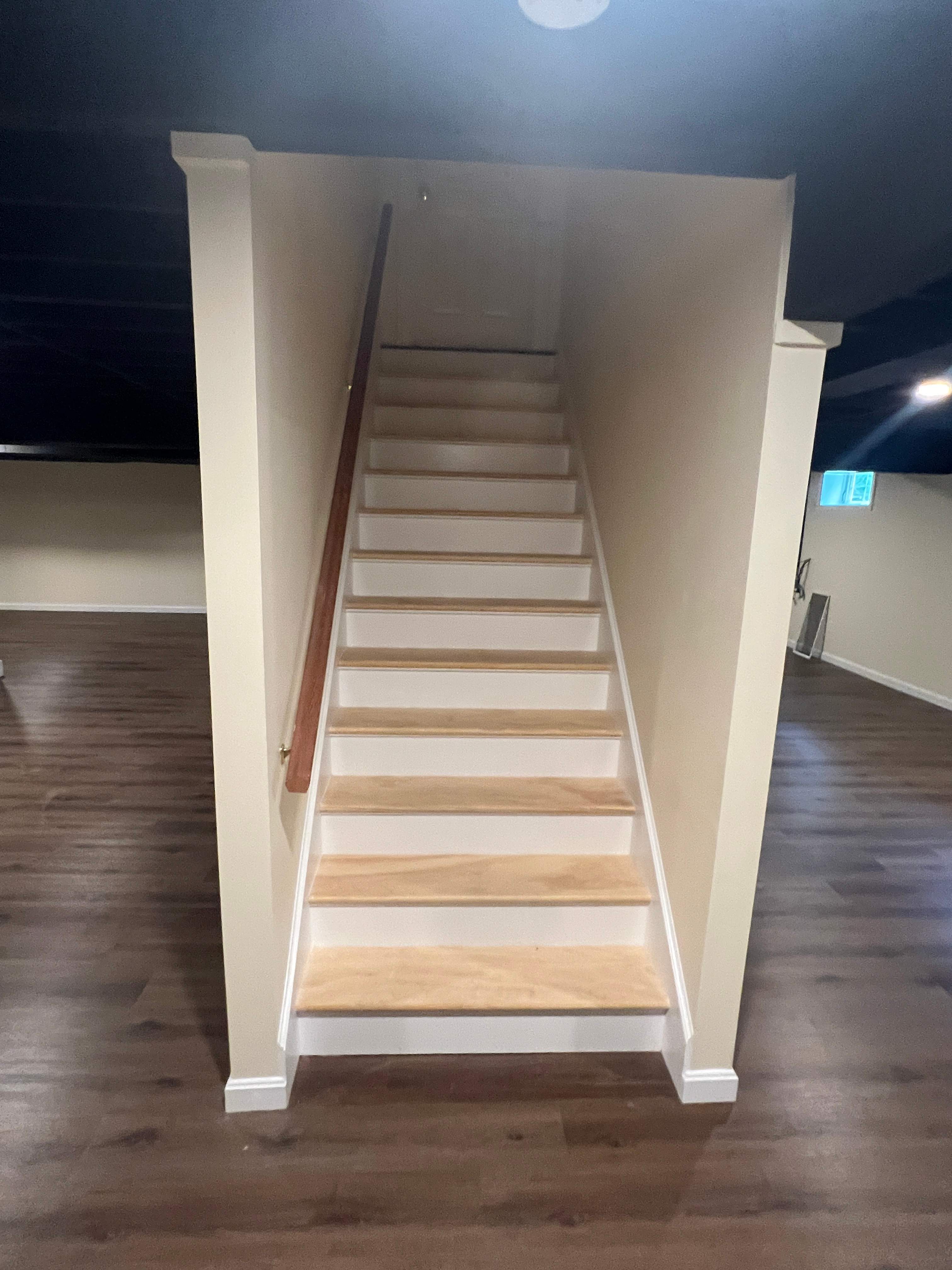 Basement Remodel w/ LVP Flooring & Exposed Ceiling by Chagnon Building & Remodeling LLC