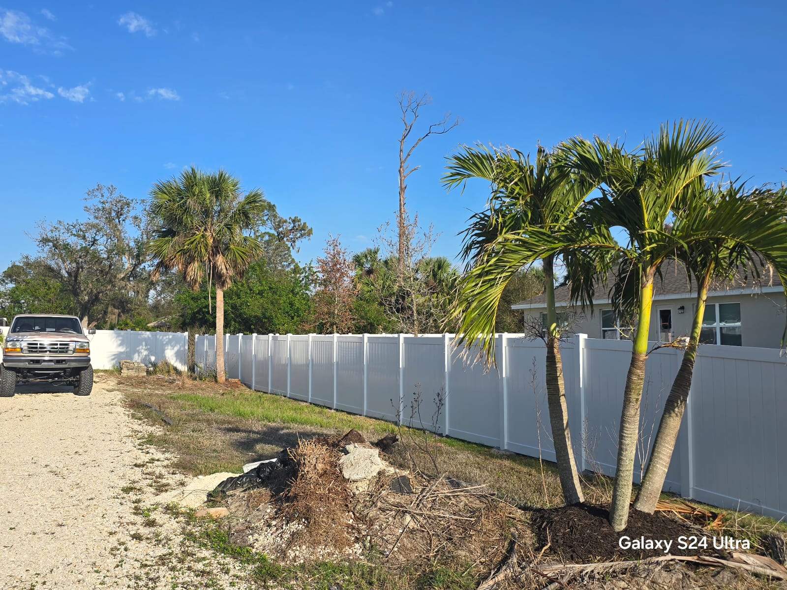 Residential White Vinyl Privacy Fence Installation in North Port by True Fence LLC