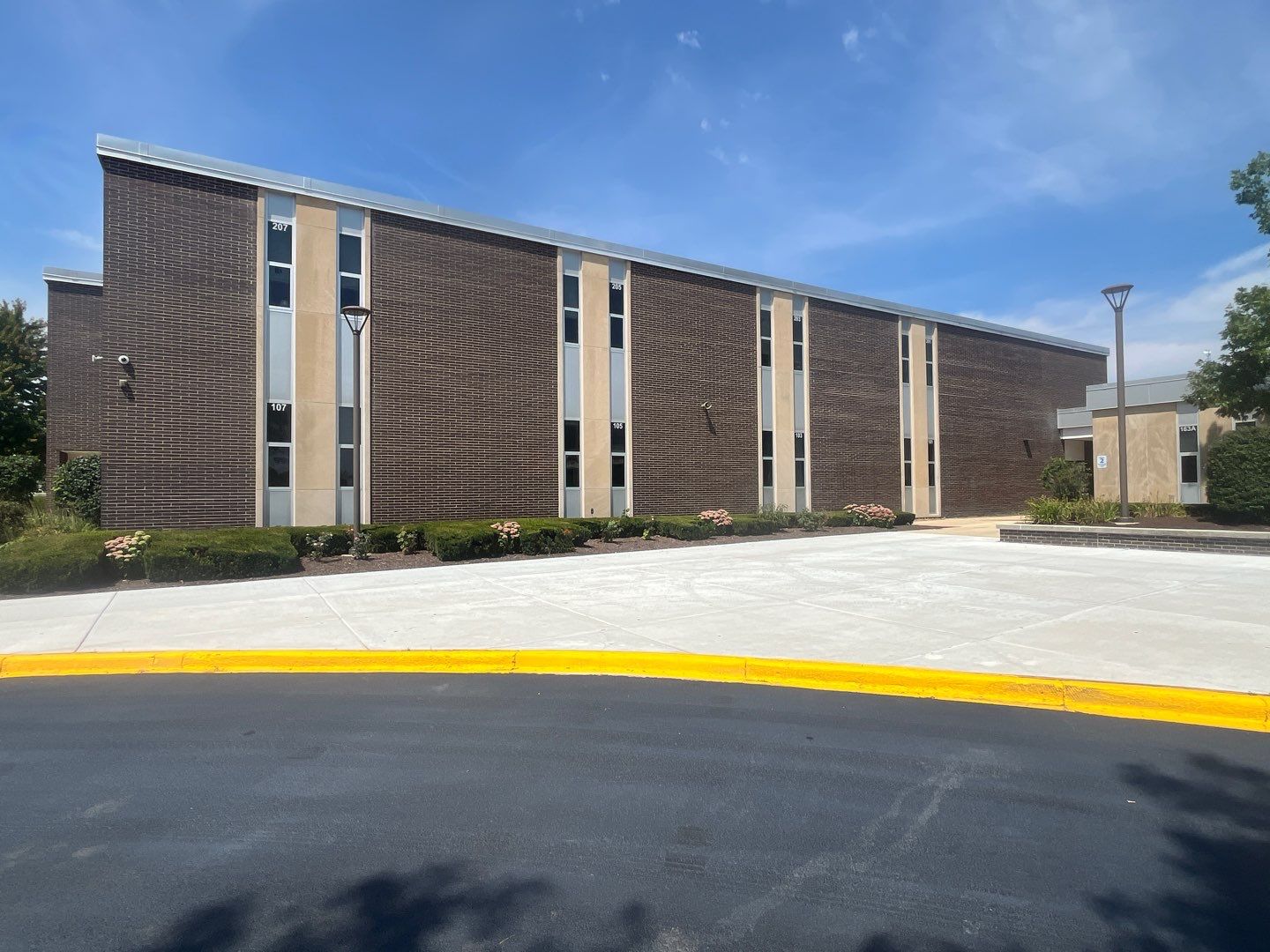 commercial pressure washing using Algaecide, soft wash soap by Northern Power Washing LLC.