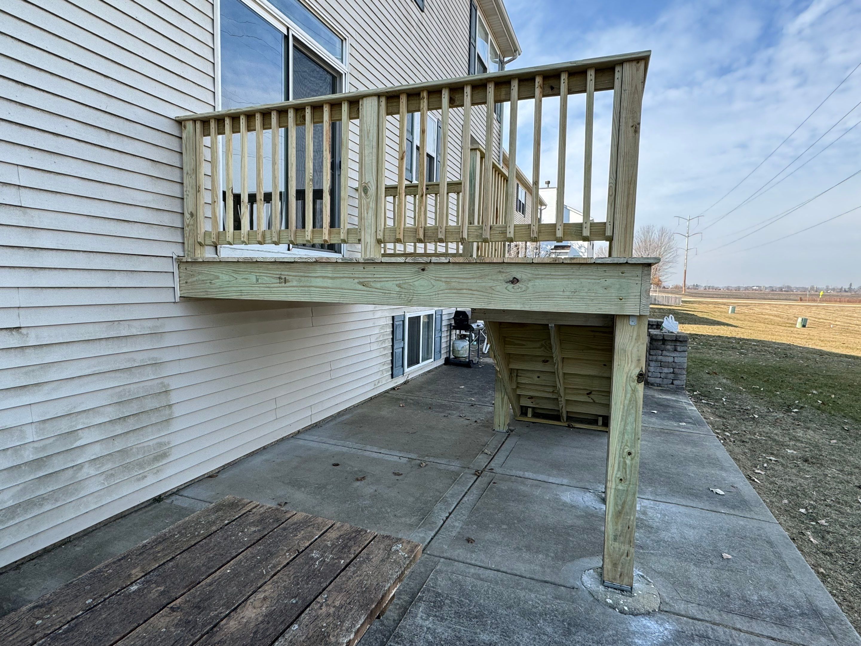 Deck Resurface with Treated SYP by Two Brothers Residential Maintenance