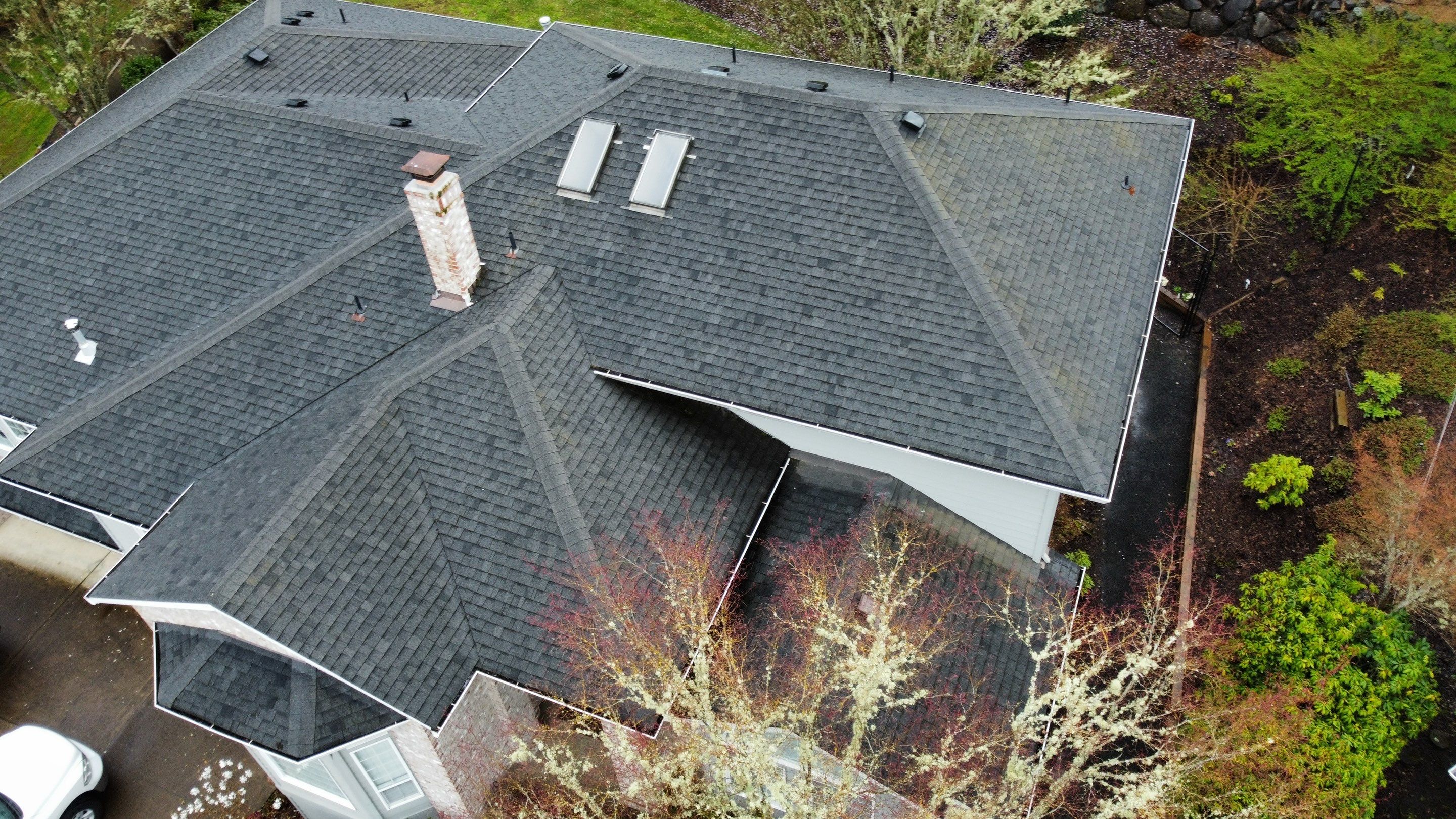 Residential Roofing Installation using IKO Dynasty (Color: Granite Black) by Orezona Building & Roofing Company, Inc.