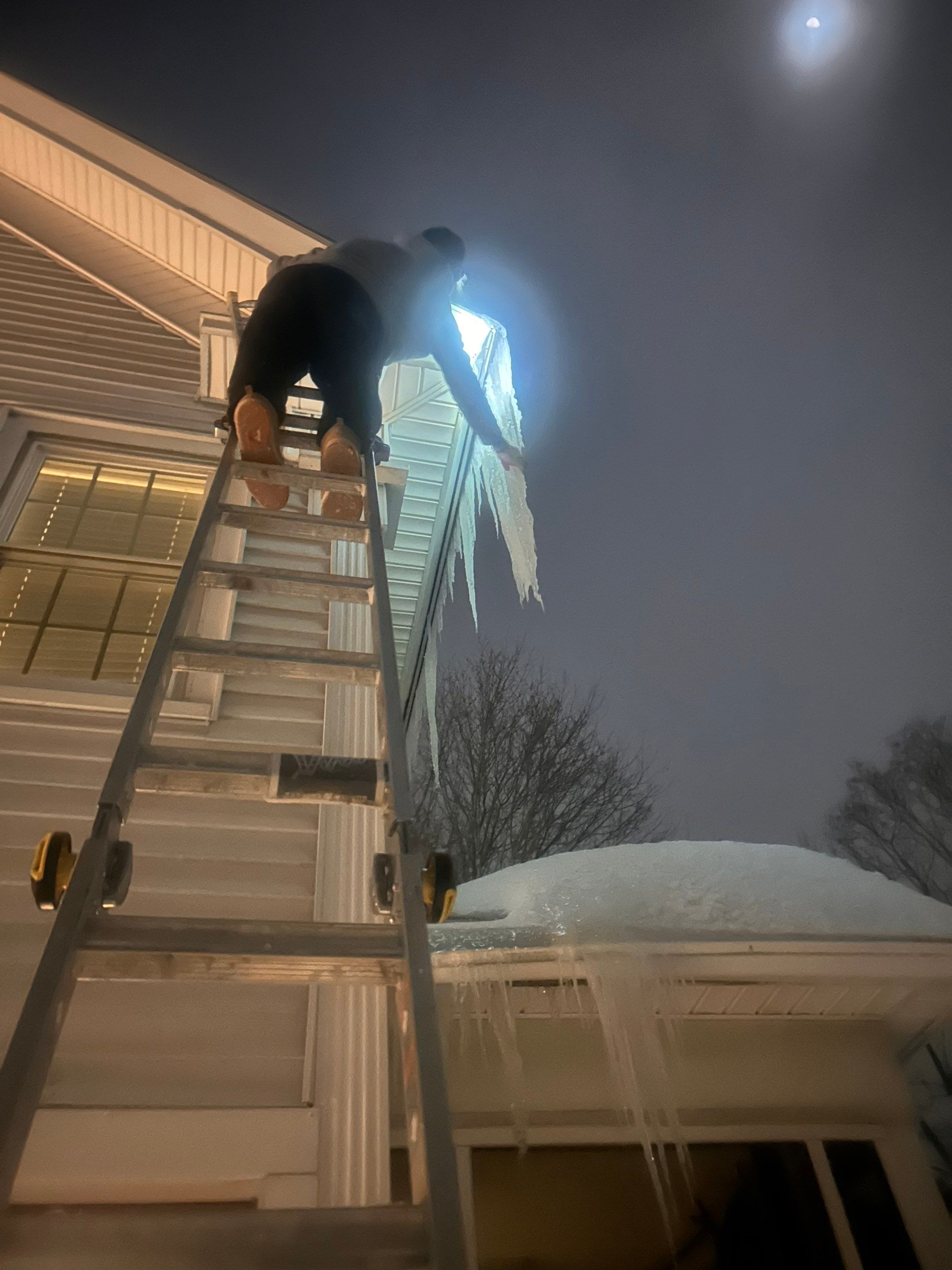 Snow and Ice dam removal by Mighty Dog Roofing of Greater Middlesex County