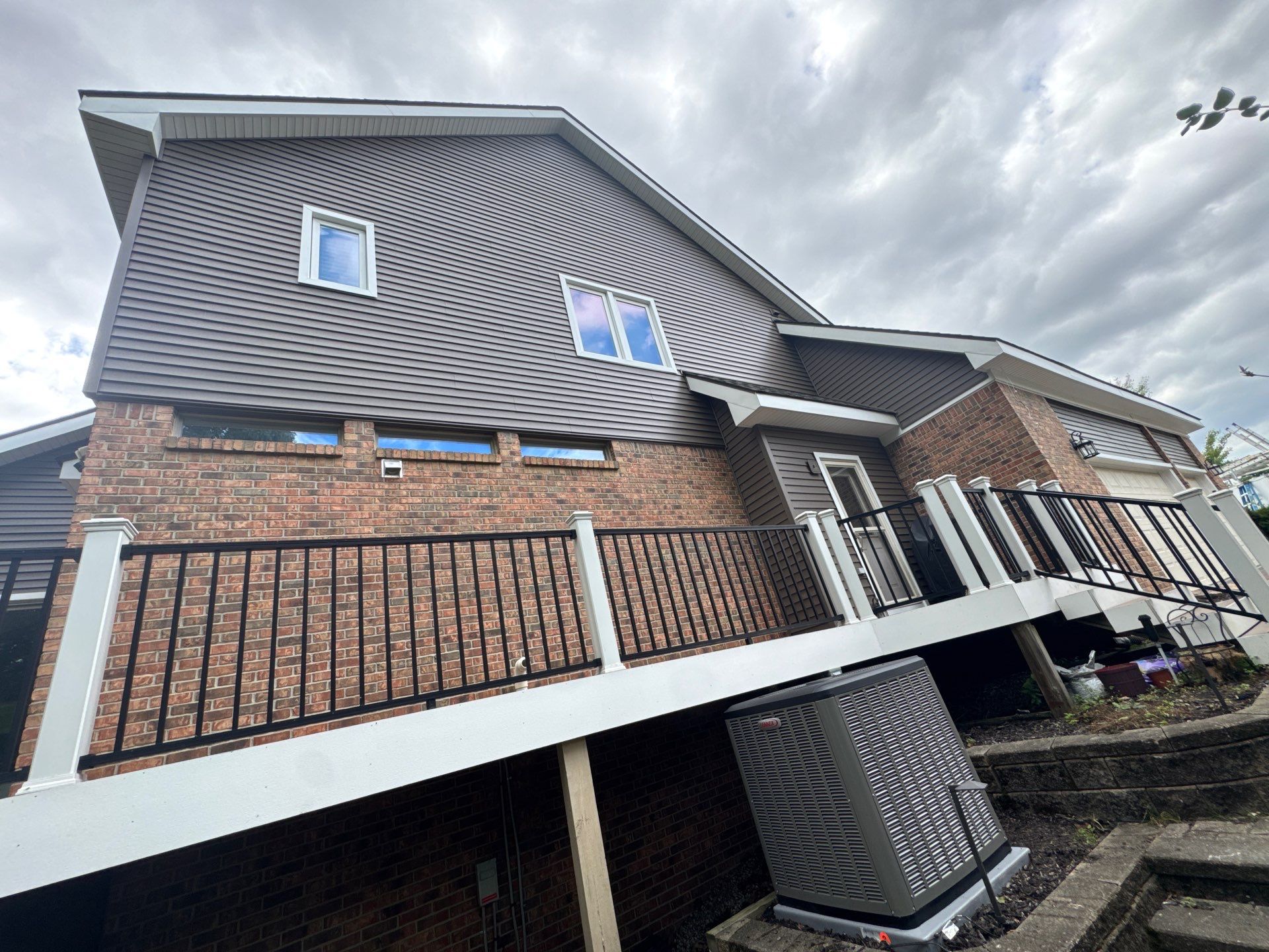 Siding Replacement using Alside Odyssey D4" Flagship Brown by 180 Contractors
