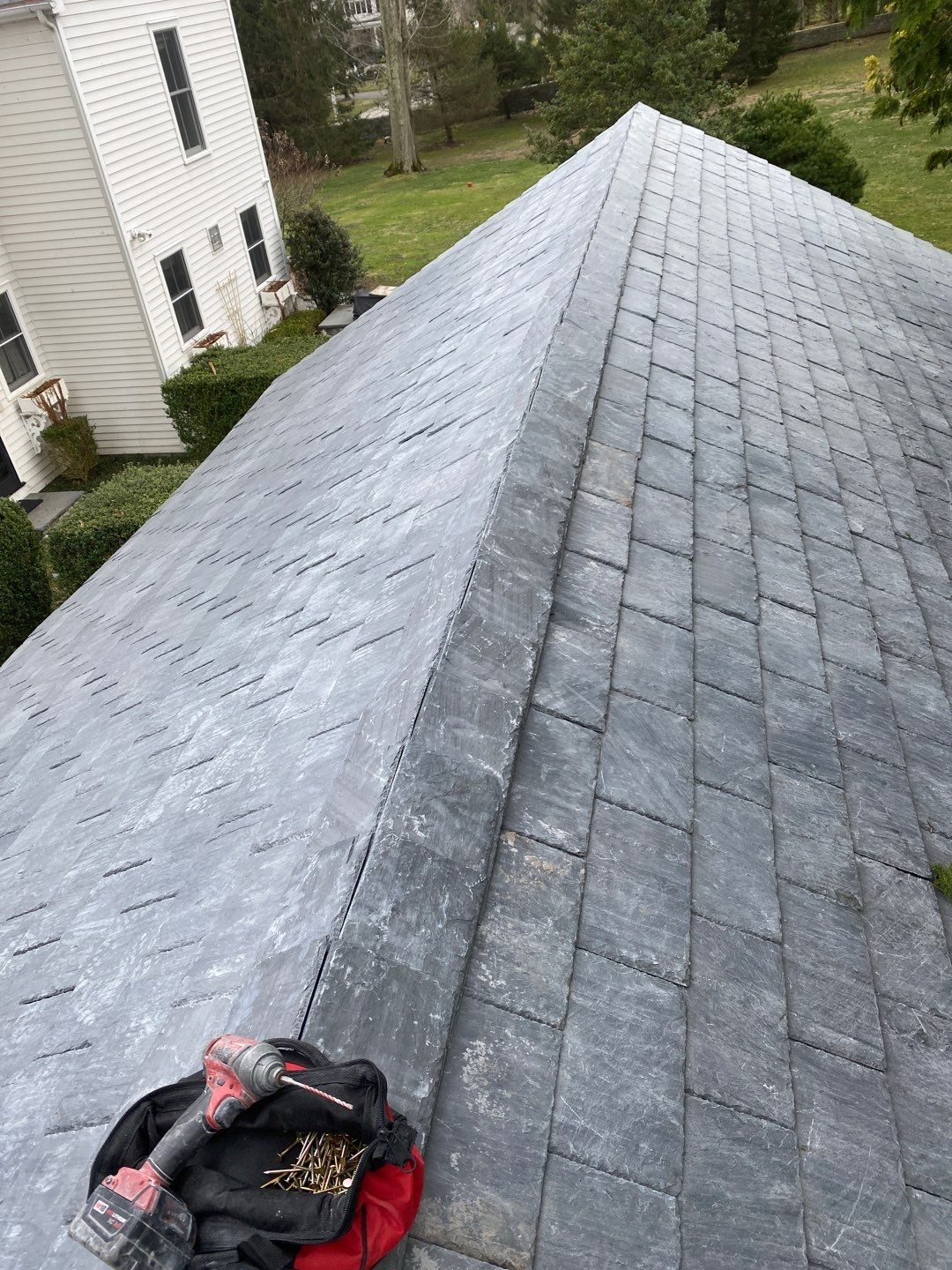 Residential Roofing Installation using Vermont Slate by A Plus Exterior