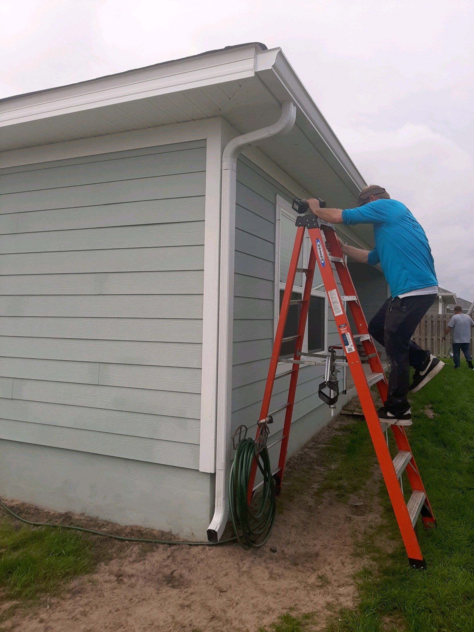 Gutter Installation Using White K-Style Seamless Gutters by Gutter Professors