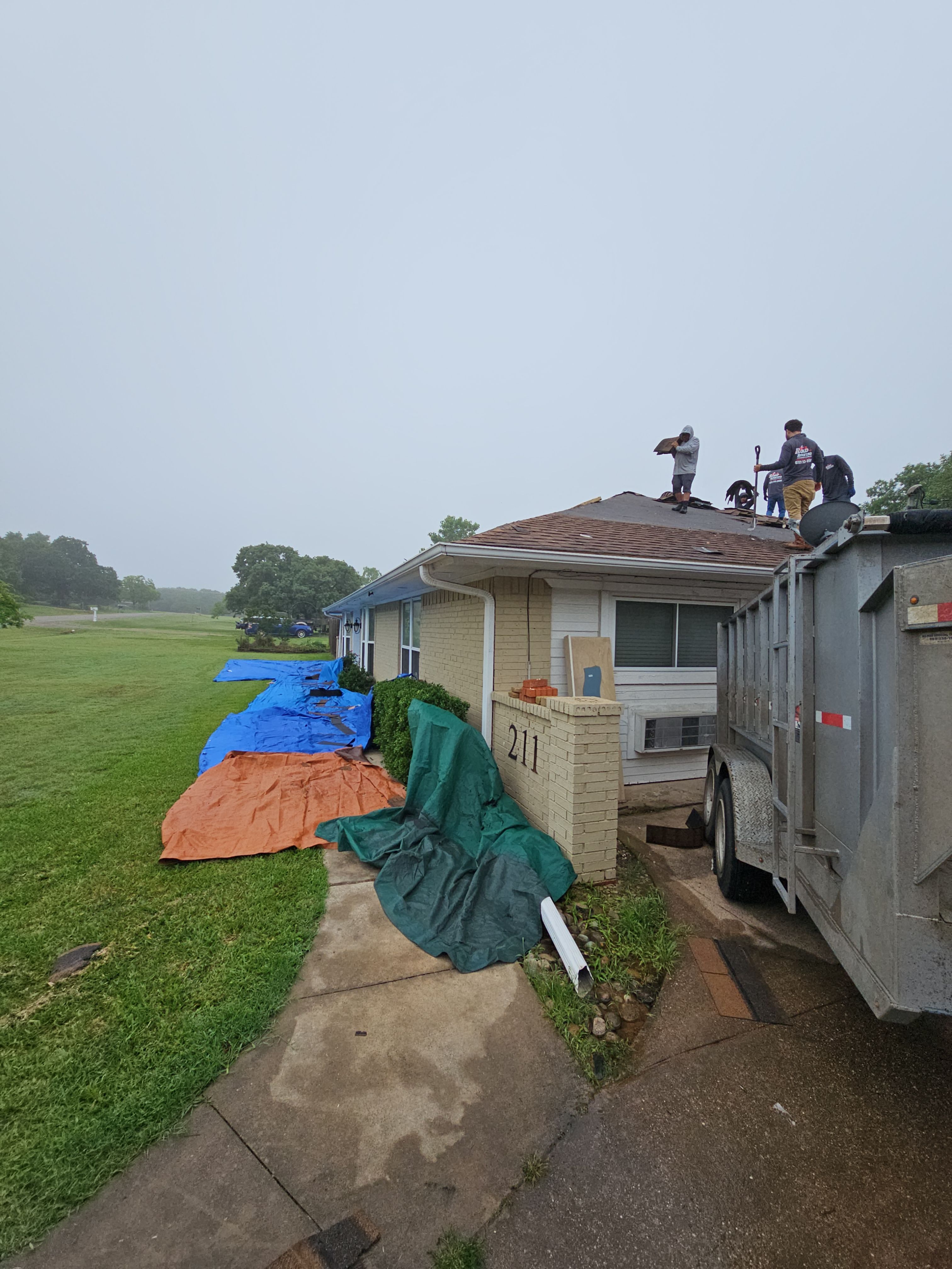 "Full Roof Replacement Due to Hail and Water Damage – Before & After" by road roofing llc