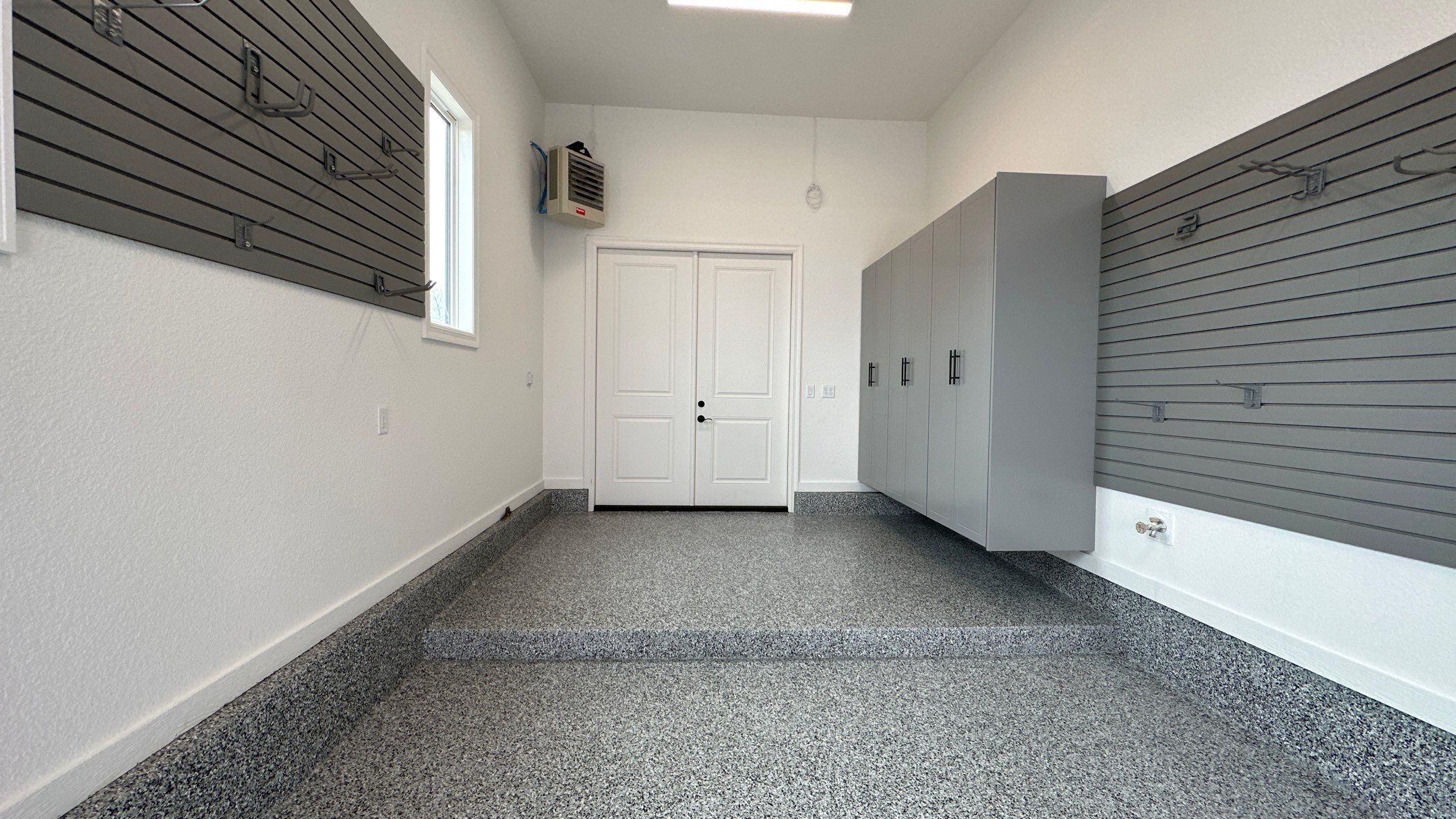Mike & Pam transformed their garage with a Banner Garage Floor and Cabinets by Banner Garage