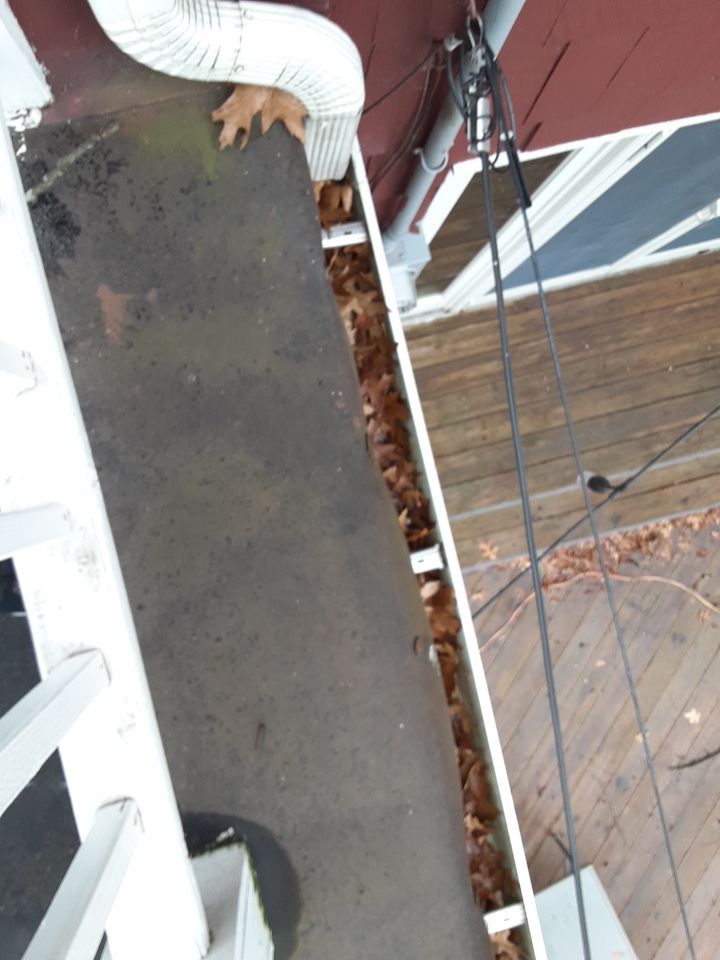 Residential Roof Replacement using Patio Roof by Absolute Roofing and Construction