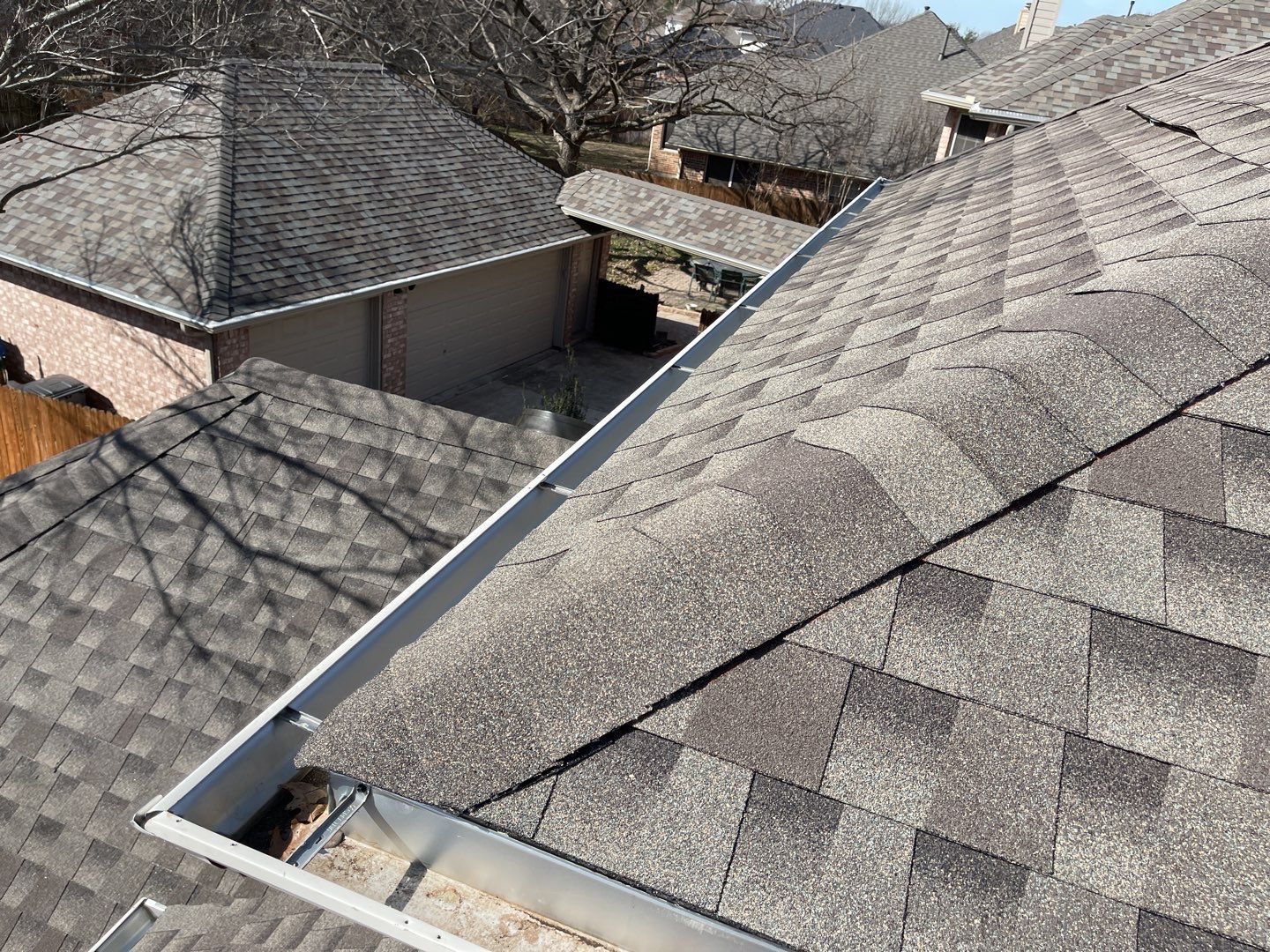Major storm damage required full roof replacement along with other exterior repairs by First United Roofing & Construction