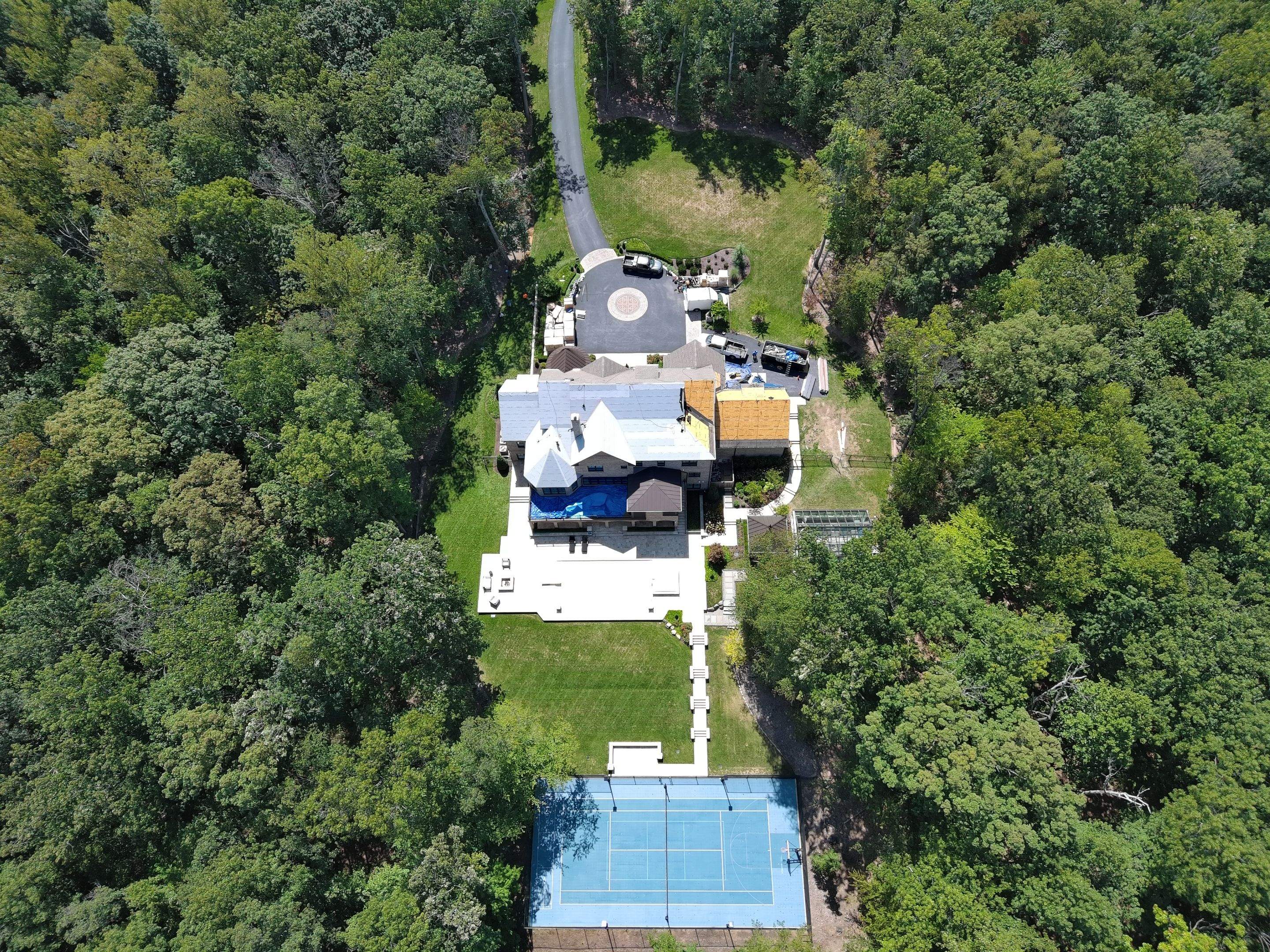 STUNNING Tesla Solar Roof in Virgina by American Home Contractors