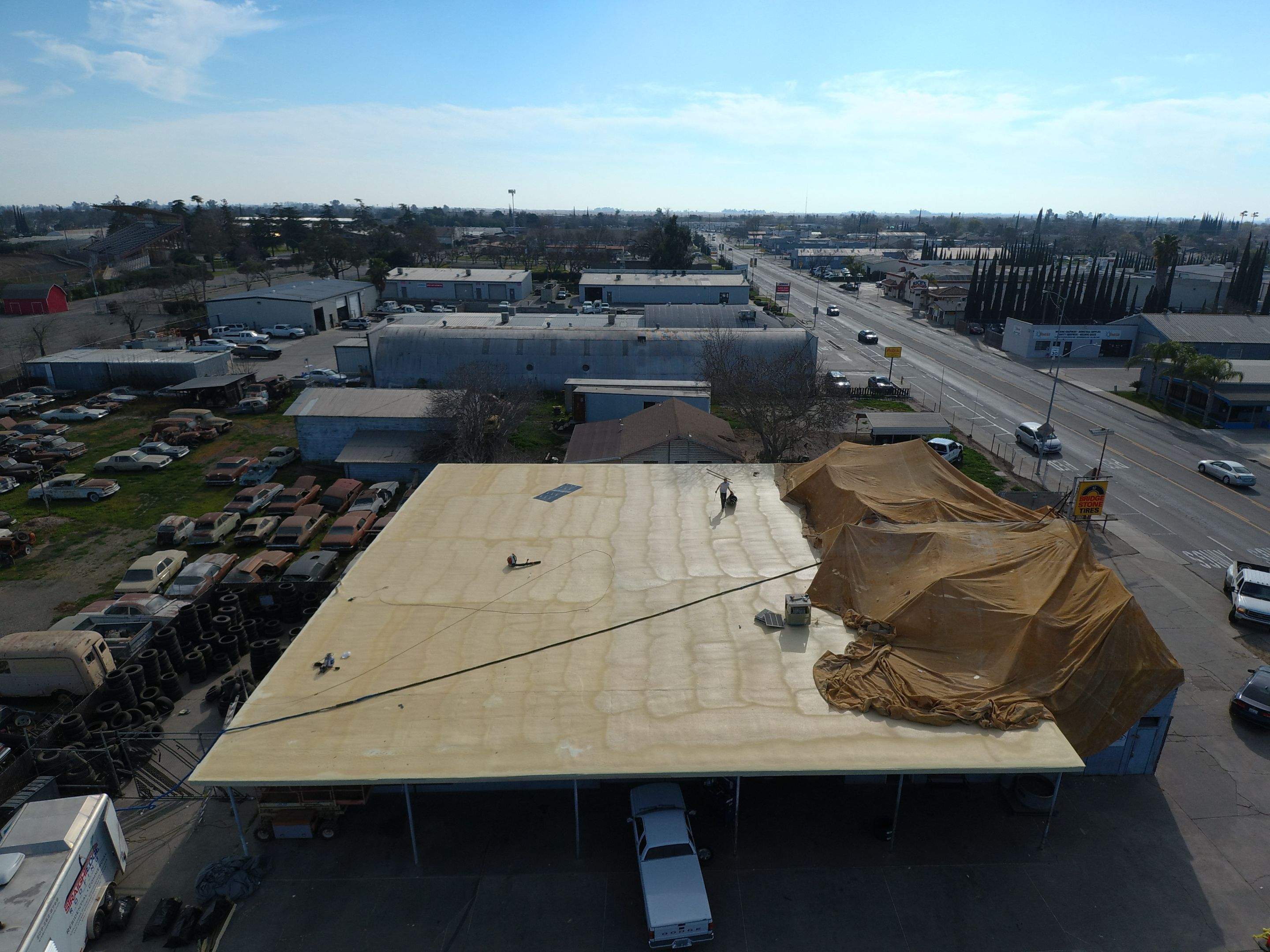 Spray foam and coatings using Conklin Benchmark/PUMA XL coatings and spray foam by Straight Edge Roofing Inc
