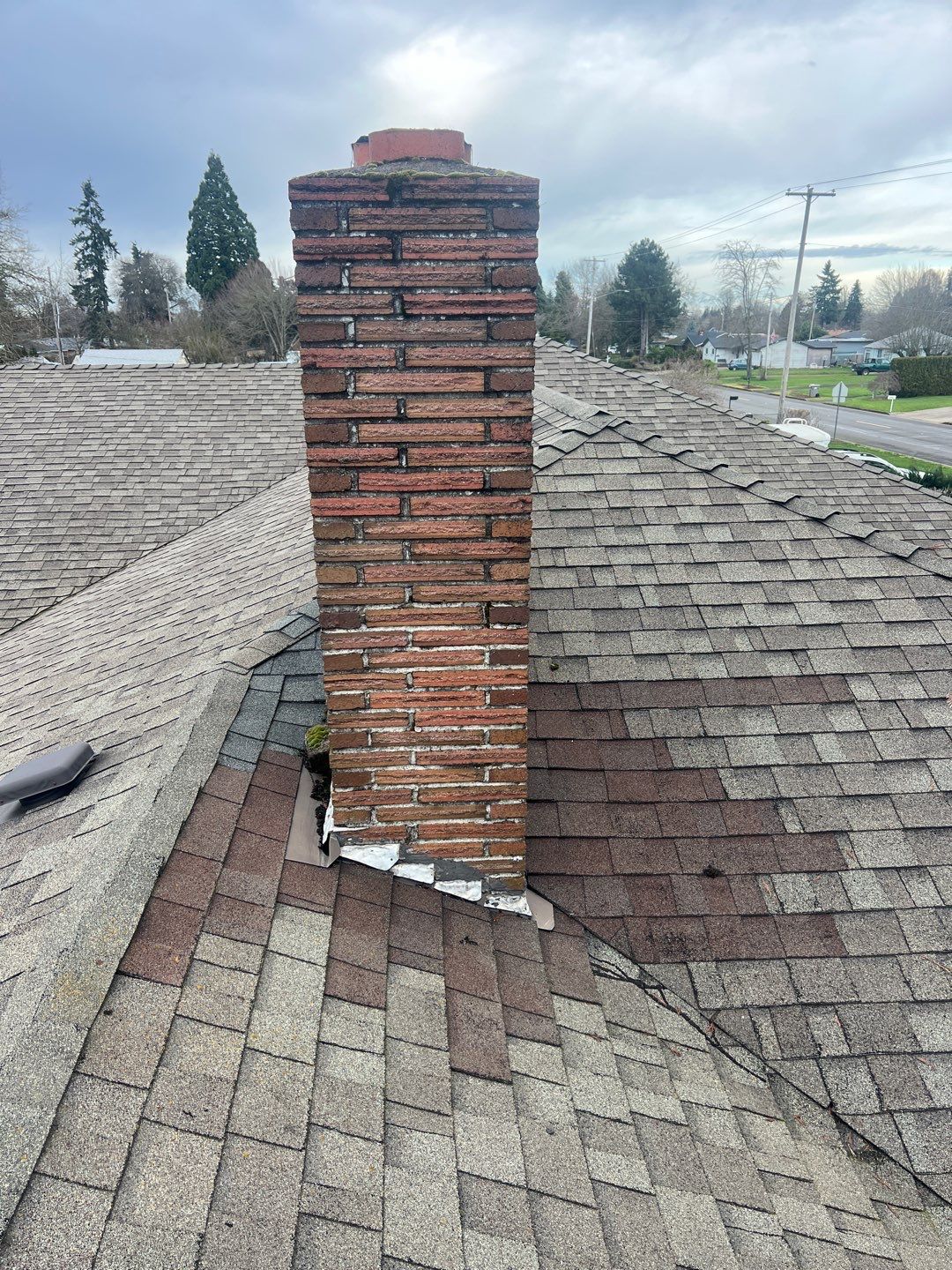 Residential Roofing Installation using IKO Dynasty (Color: Granite Black) by Orezona Building & Roofing Company, Inc.