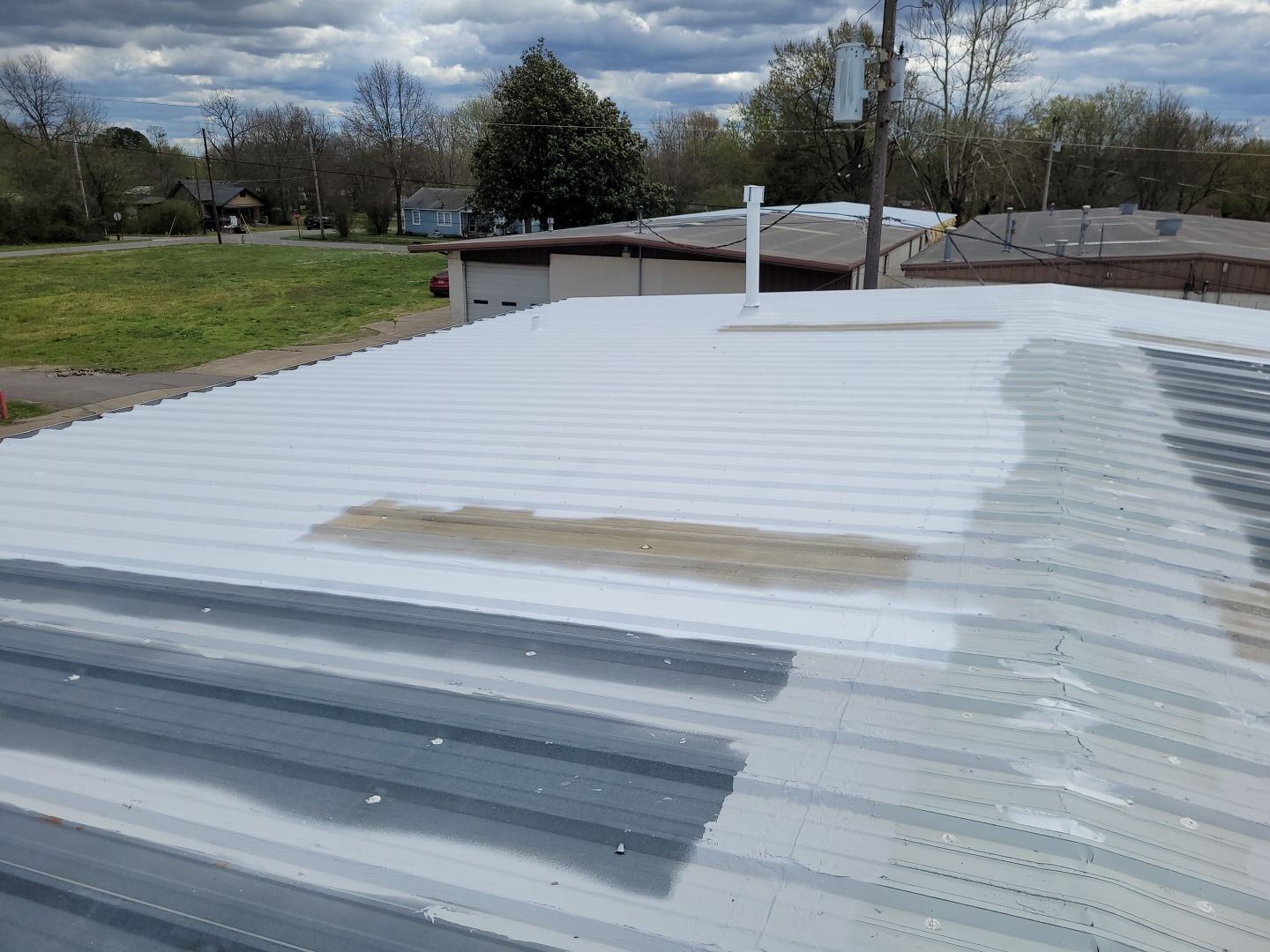Commercial Metal Restoration System using Aldocoat Coatings by Hostetler Roofing