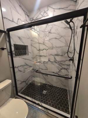 Tub to walk-in shower conversion