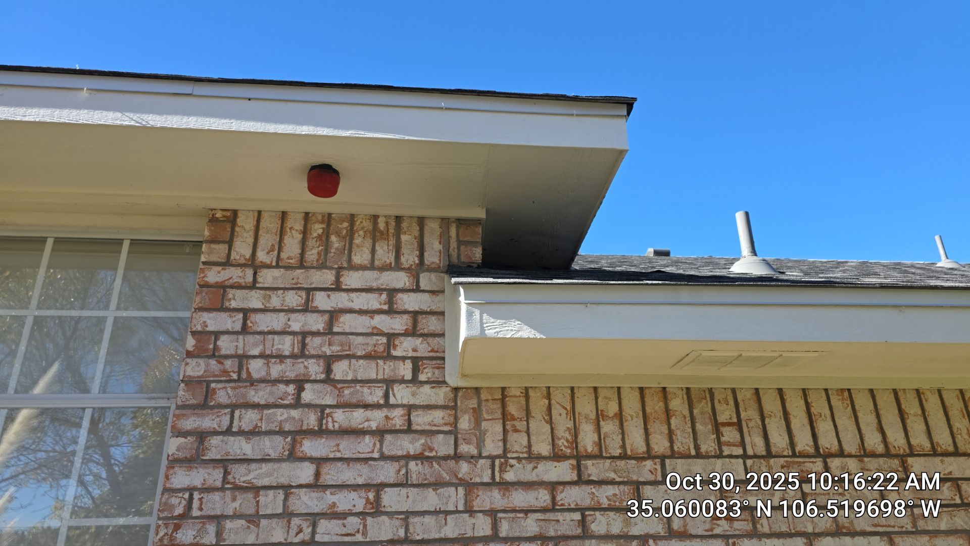 Seamless White Gutter and Downspout Installation in Albuquerque by Doyle Roof Masters Inc