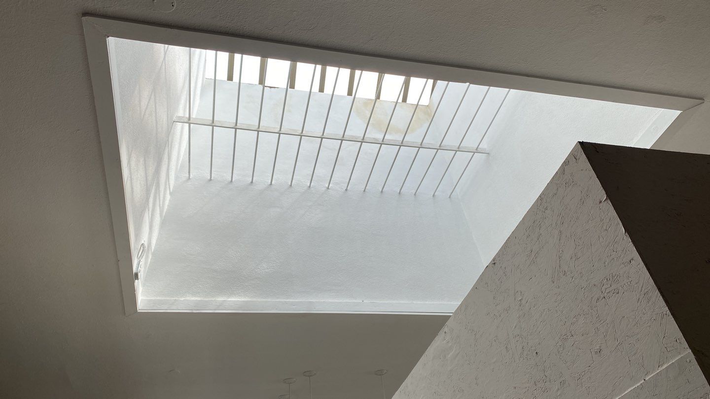 Polyurethane foam roof refurbish and recoating by Straight Edge Roofing Inc