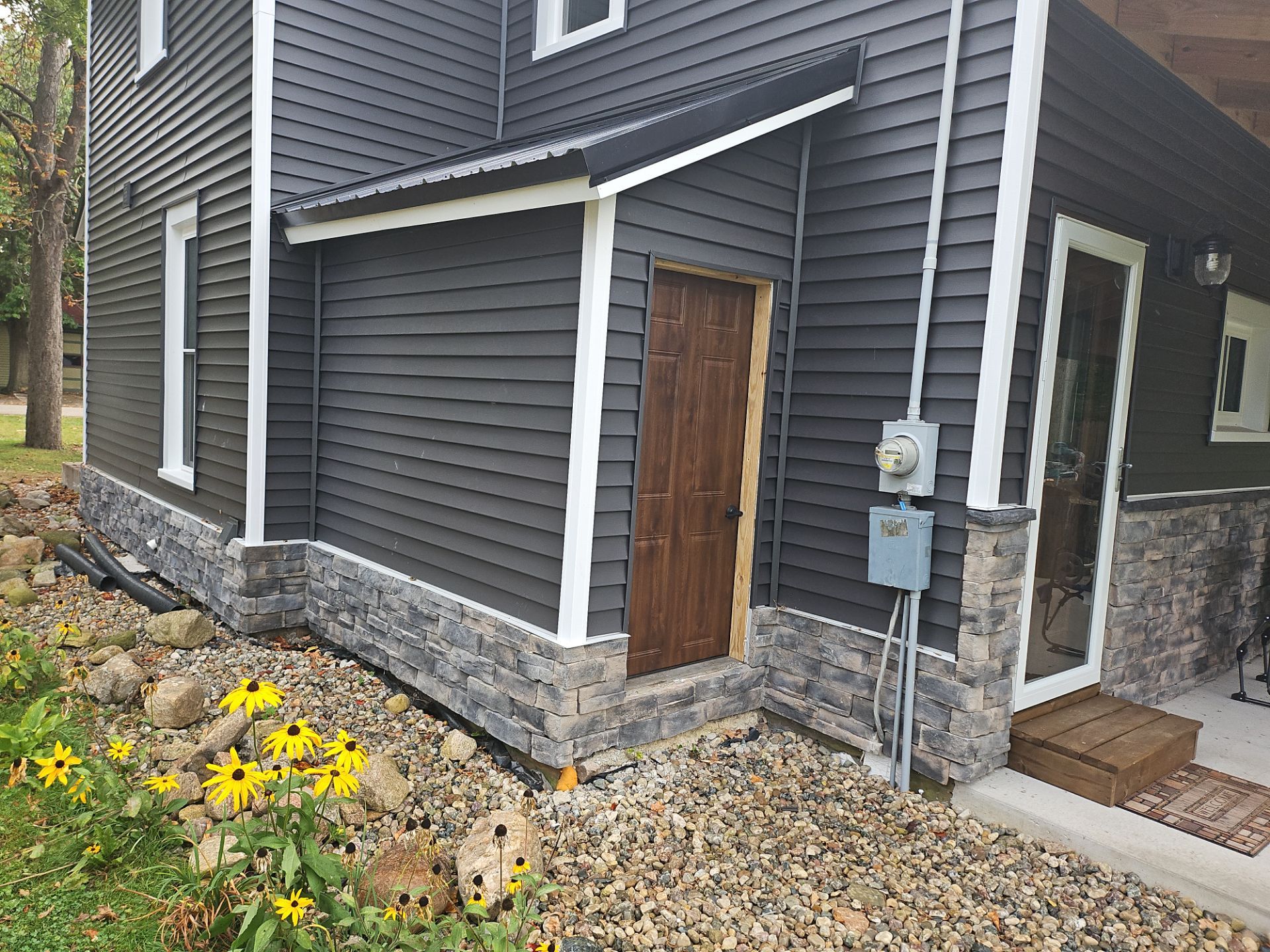 Exterior Makeover using Norandex Siding by Energy Plus Home Improvements