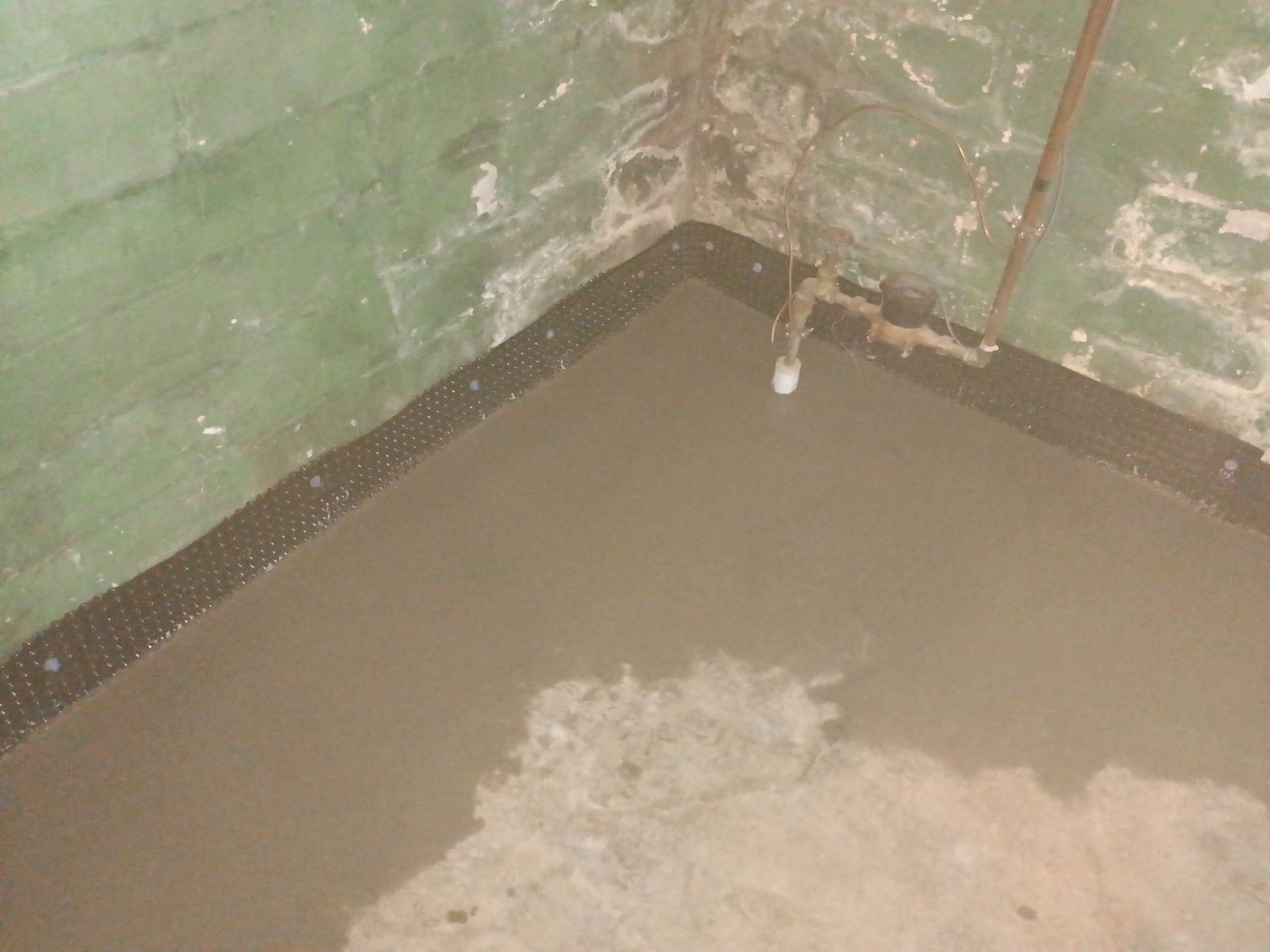 Interior Drain Tile for a South Minneapolis Basement by Waterproofing Northeast