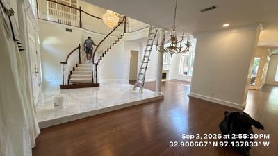 Luxury Interior Renovation with Marble Flooring and Custom Master Suite