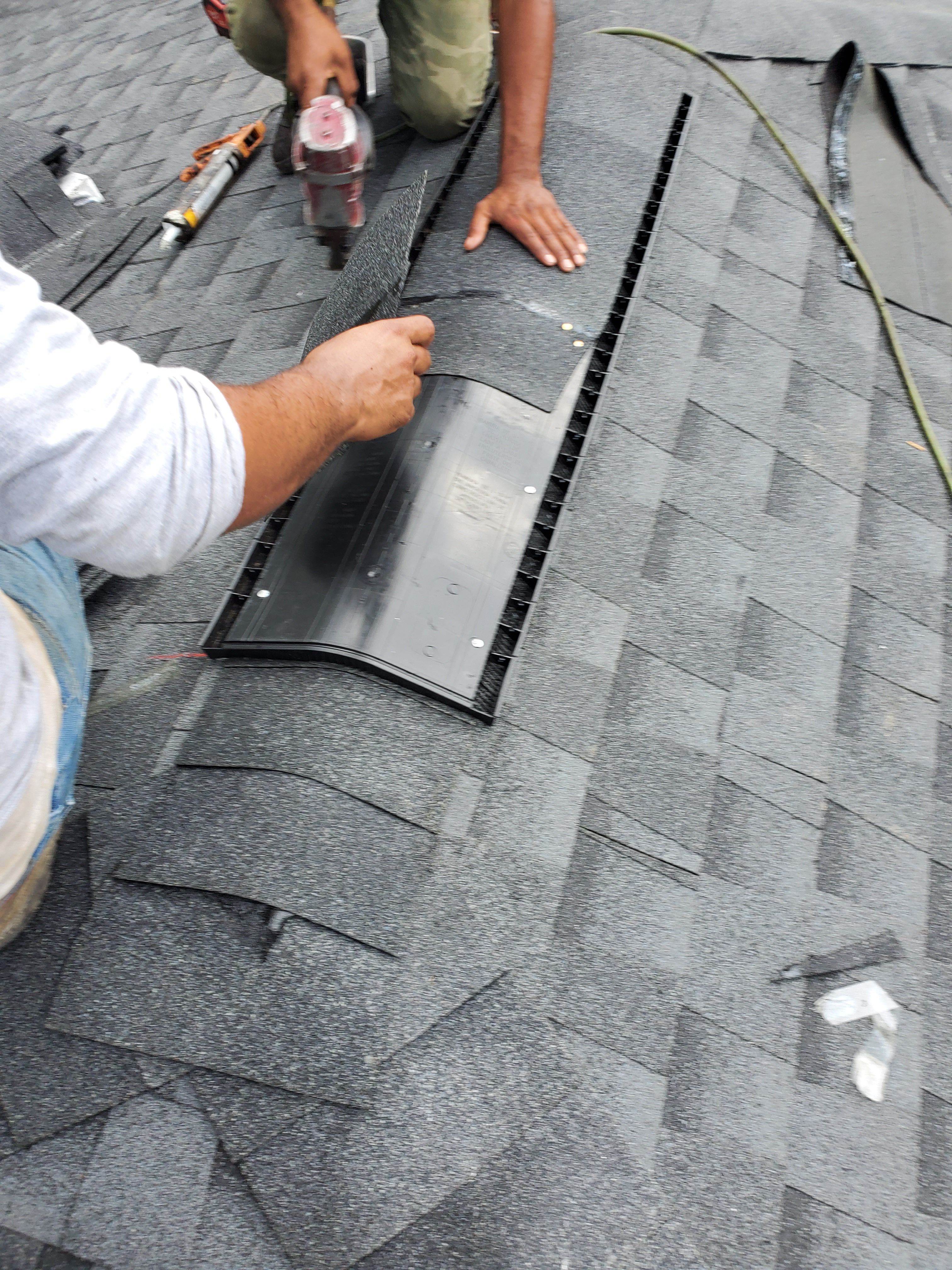 Residential Roofing Installation using Roof Replacement by American Roofing & Construction LLC