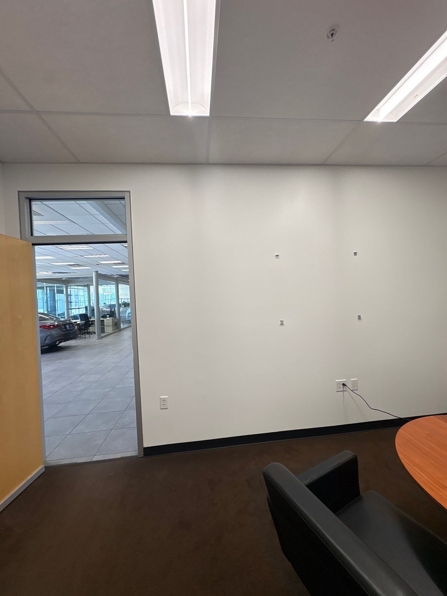 Interior Painting and Drywall Patching for Sioux Falls Commercial Showroom by Select Painting, Coatings & Garage Cabinets