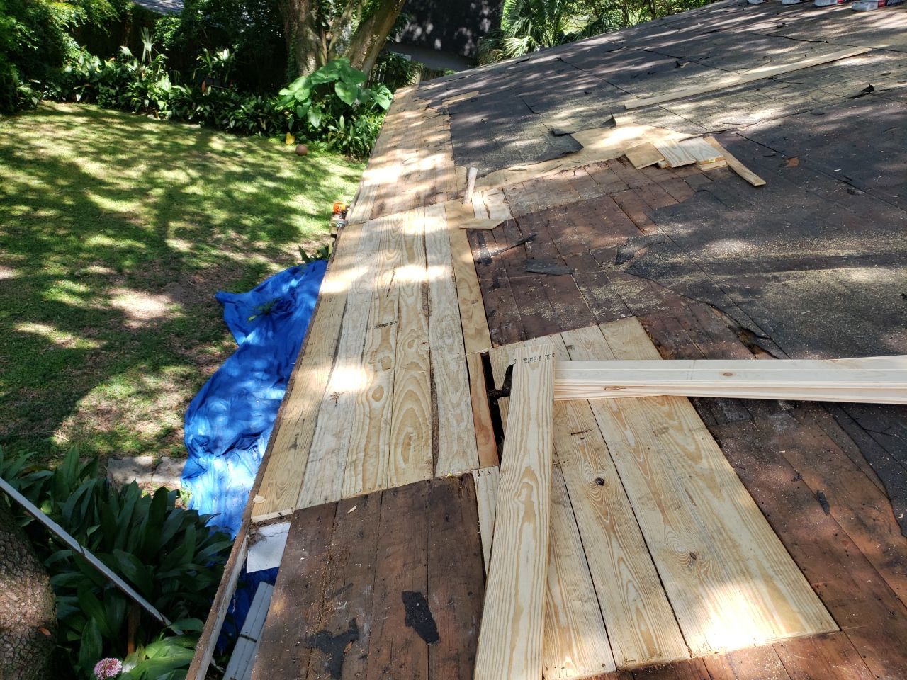 Residential Roofing Repair using Roof Replacement by American Roofing & Construction LLC