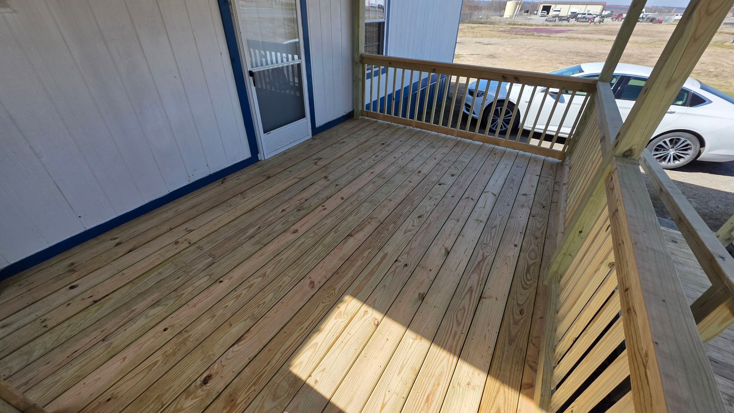 Covered Deck w/ ADA Ramp by In & Out Construction & Remodeling, LLC